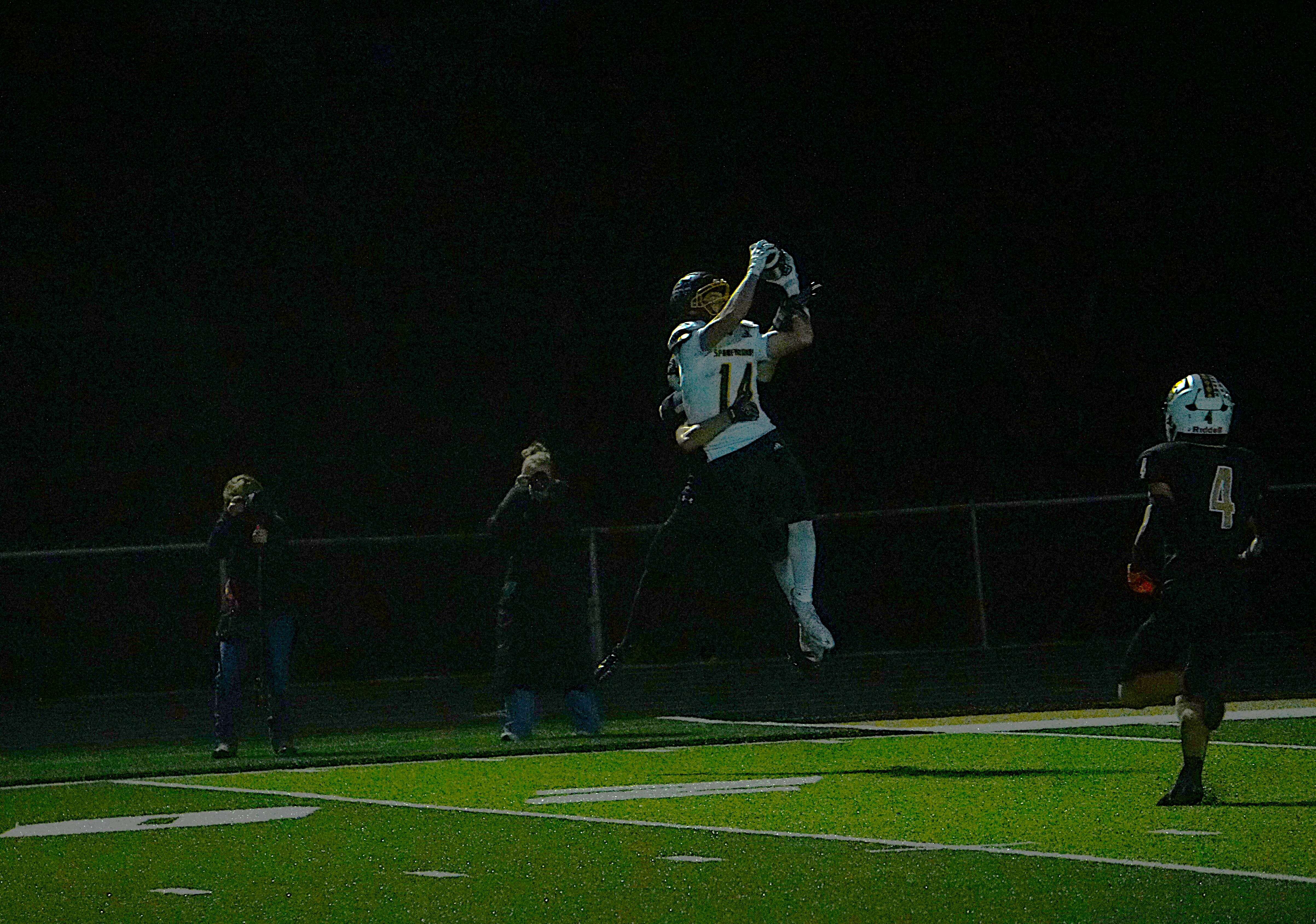 Maryville's Lucas Ziegler makes a leaping grab in the first quarter/ Photo by Matt Pike