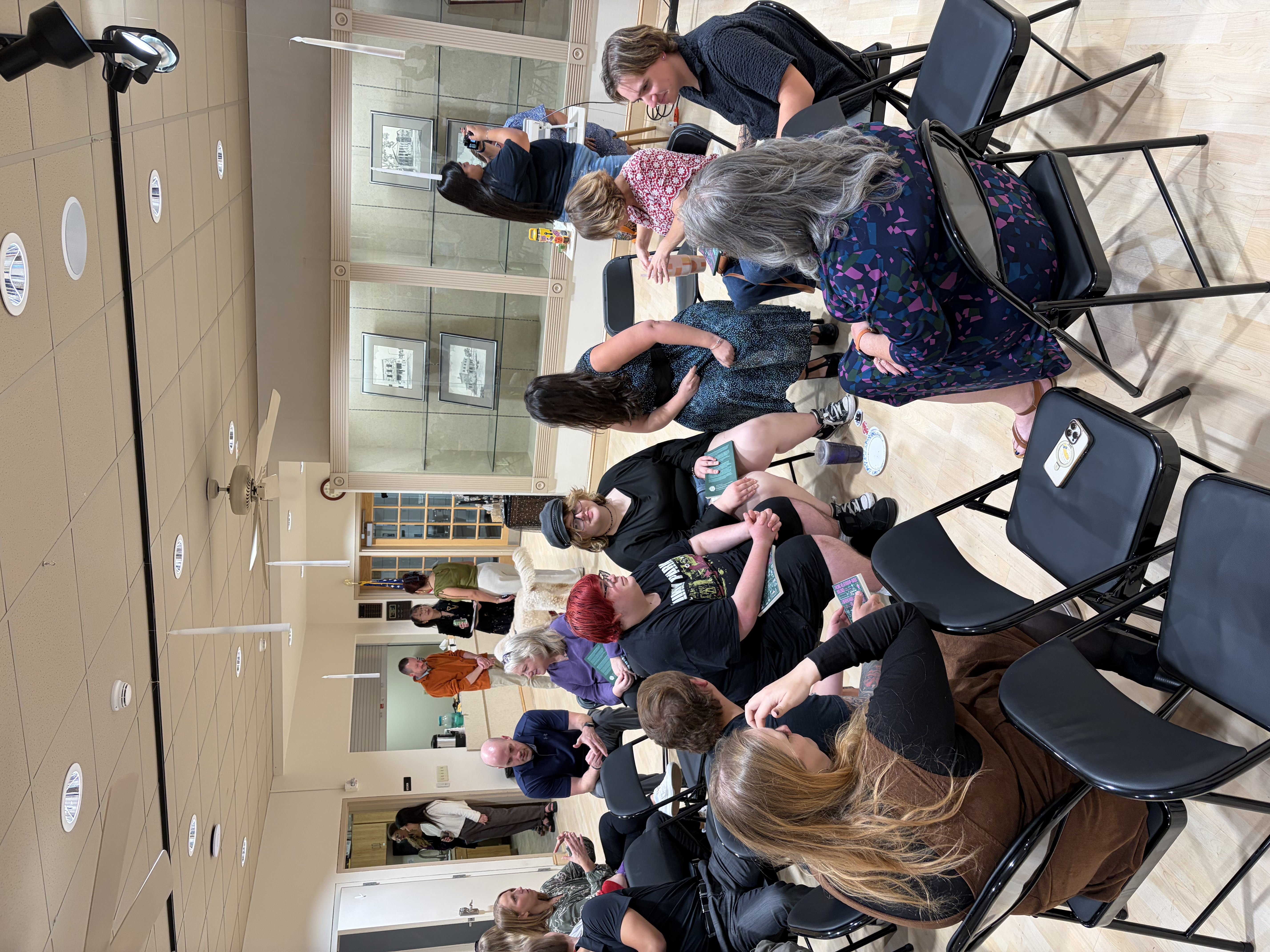 One of the listening circles created by audience members that included Benjamin Wilkerson, FHSU senior who worked as a listener and writer, and Jennifer Hecker, executive director for Options. Photo by Alin Hett/Hays Post.&nbsp;