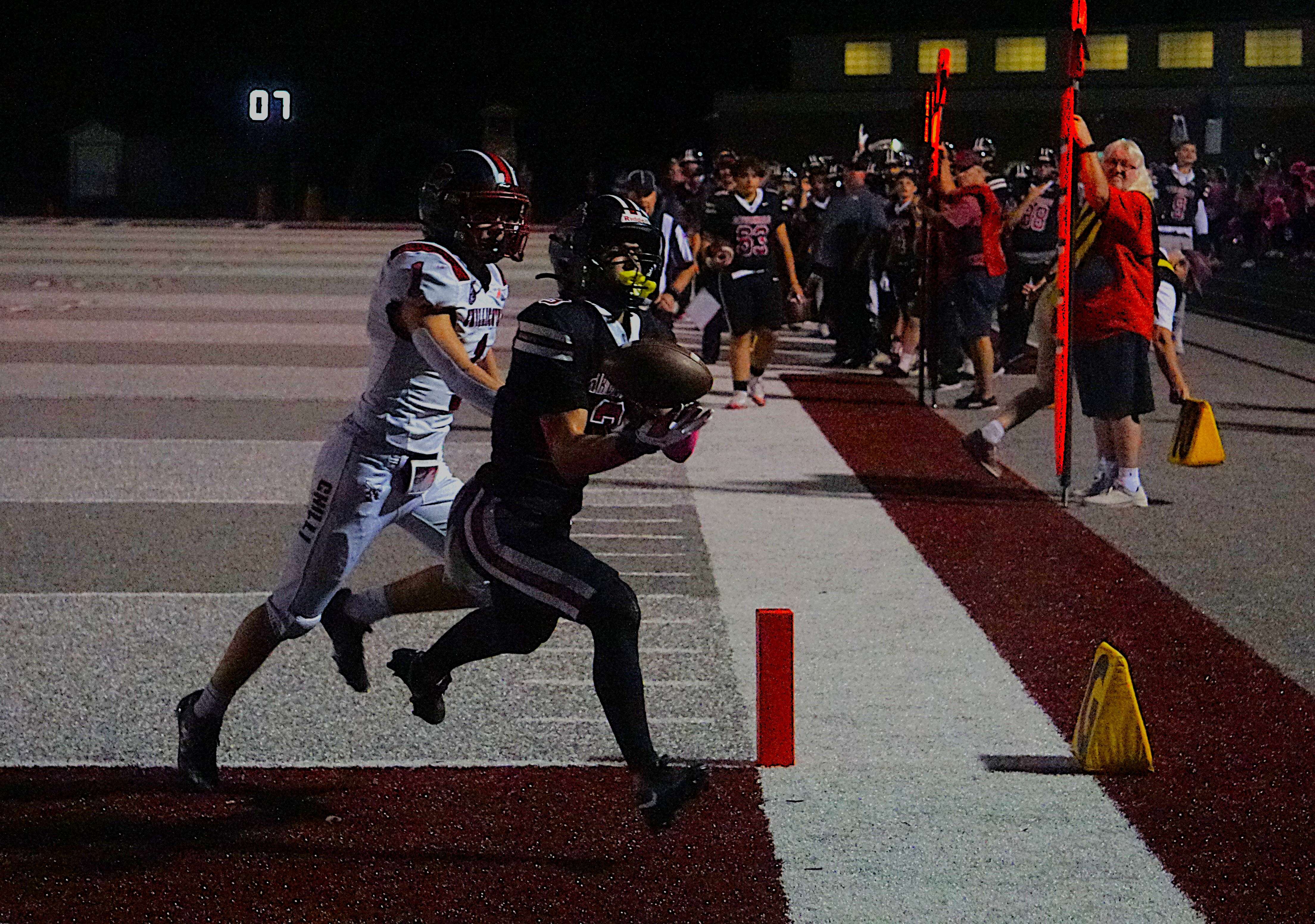 Porter McCarthy hauls in a touchdown pass from Boston Cook against Chillicothe/ Photo by Matt Pike