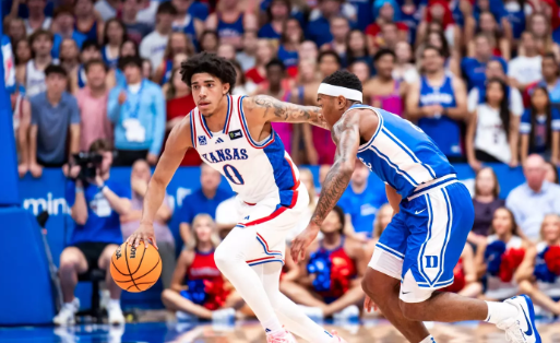 Kansas freshman Taylen Kinney (0) brings the ball up the floor against Duke in an NCAA exhibition basketball game on Sunday, October 25, 2026 in Lawrence, Kan. (Kansas Athletics photo)