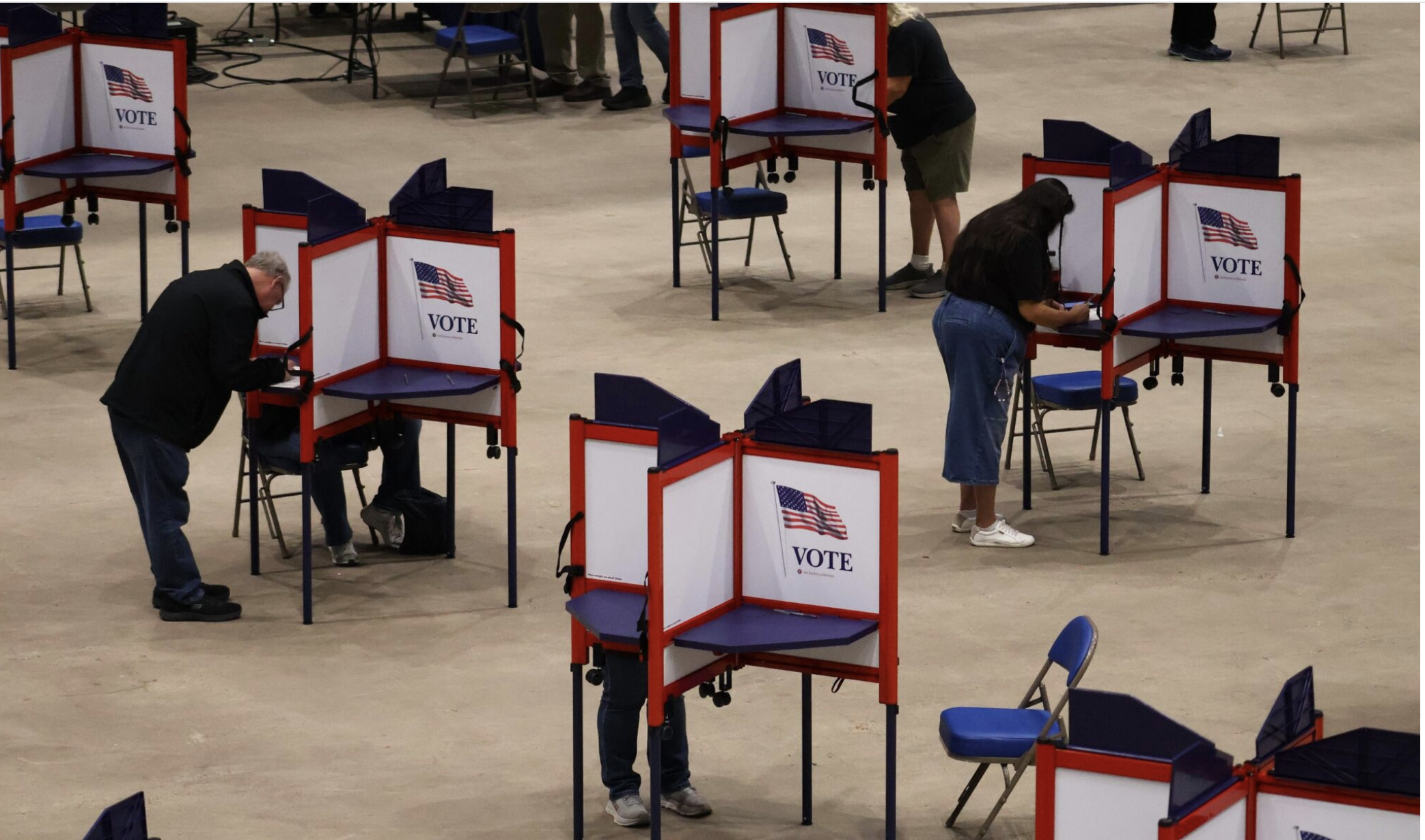 Voters mark their ballots during the first day of early voting at the Bismarck Event Center in Bismarck, North Dakota, on Oct. 22, 2026. (Photo by Jack Dura/North Dakota Monitor)
