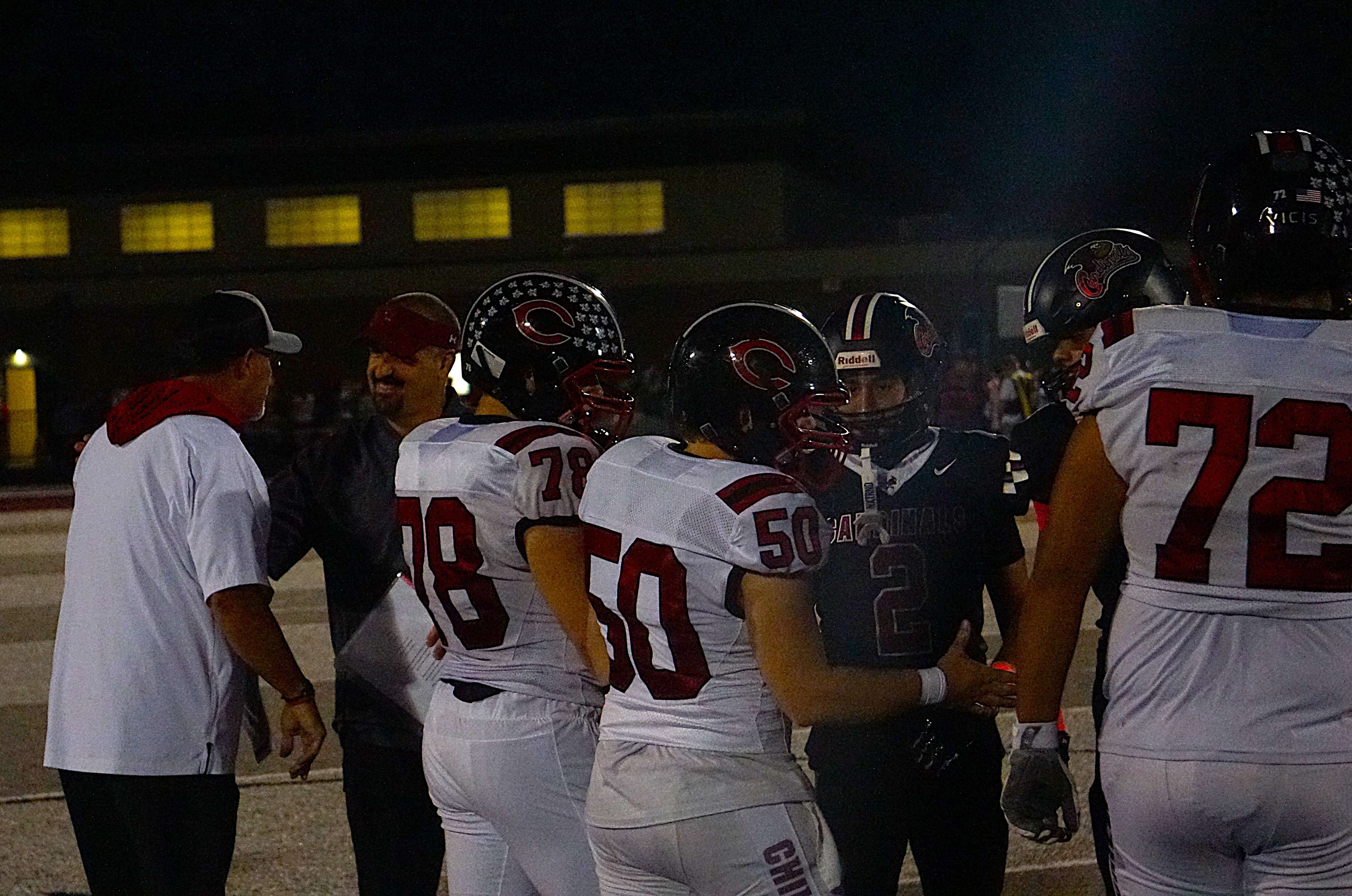 Benton Head Coach Mark Cole and Chillicothe Head Coach Jeff Staton shake hands before the coin toss last Friday. Cole was named Kansas City Chiefs High School Coach of the Week for week 8 in Missouri/ Photo by Matt Pike