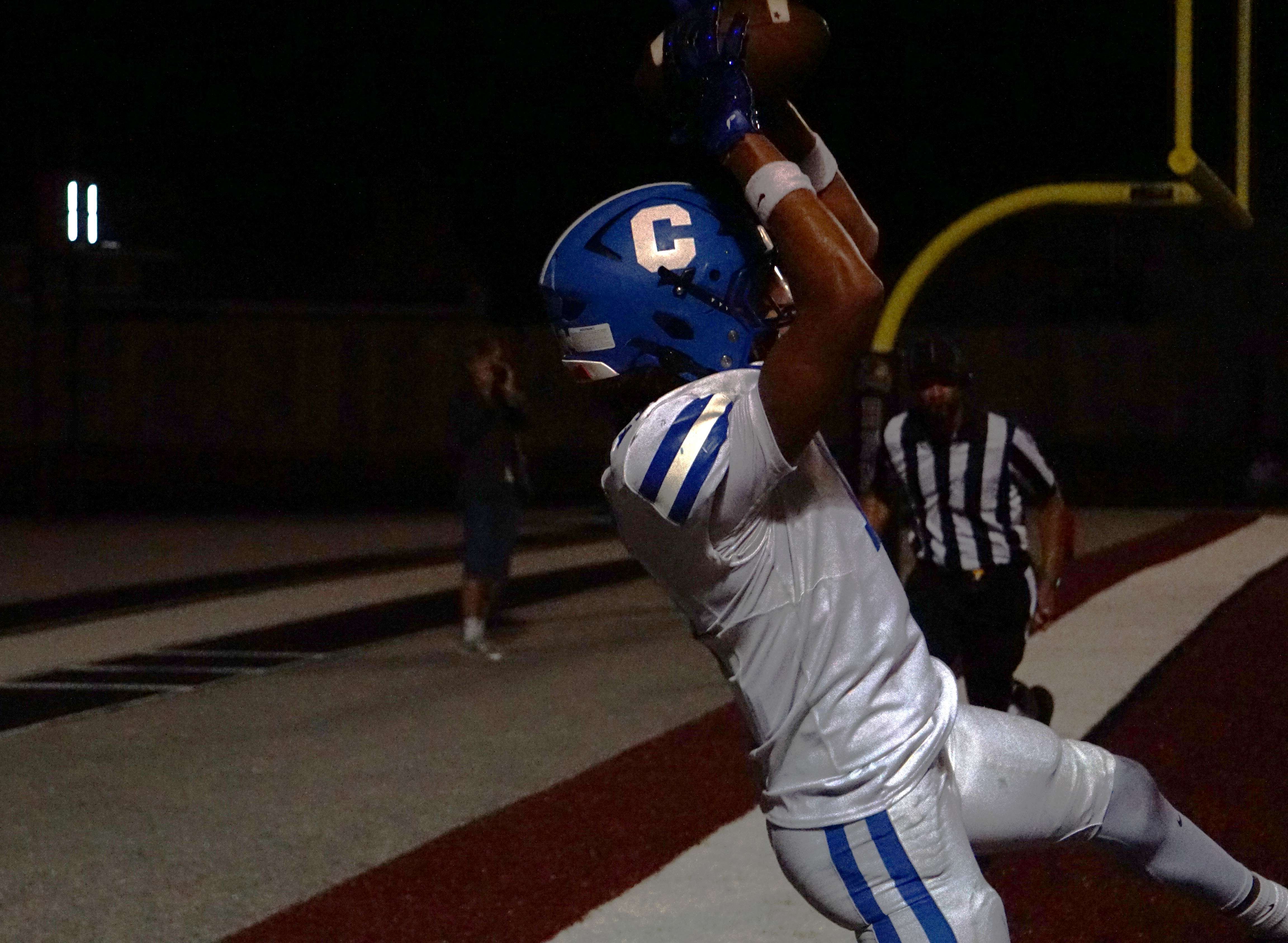 Evan Parksel hauls in a touchdown for Central just before halftime against Benton/ Photo by Matt Pike