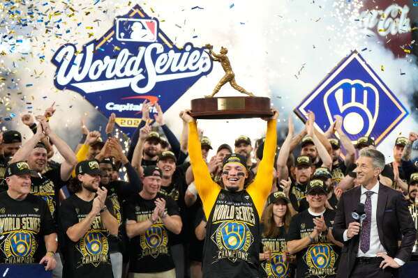 Milwaukee Brewers catcher William Contreras holds the MVP trophy after winning baseball's World Series against the Tampa Bay Rays, Wednesday, Oct. 28, 2026, in St. Petersburg, Fla. (AP Photo/Morry Gash)