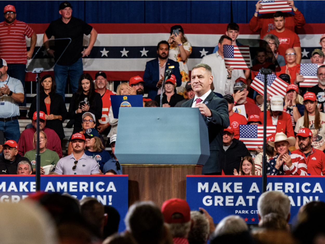 Kansas Rep. Pat Proctor prepares to speak ahead of President Donald Trump’s rally Oct. 19, 2026, at Heartland Credit Union Arena in Park City. (Photo by Sherman Smith/Kansas Reflector)