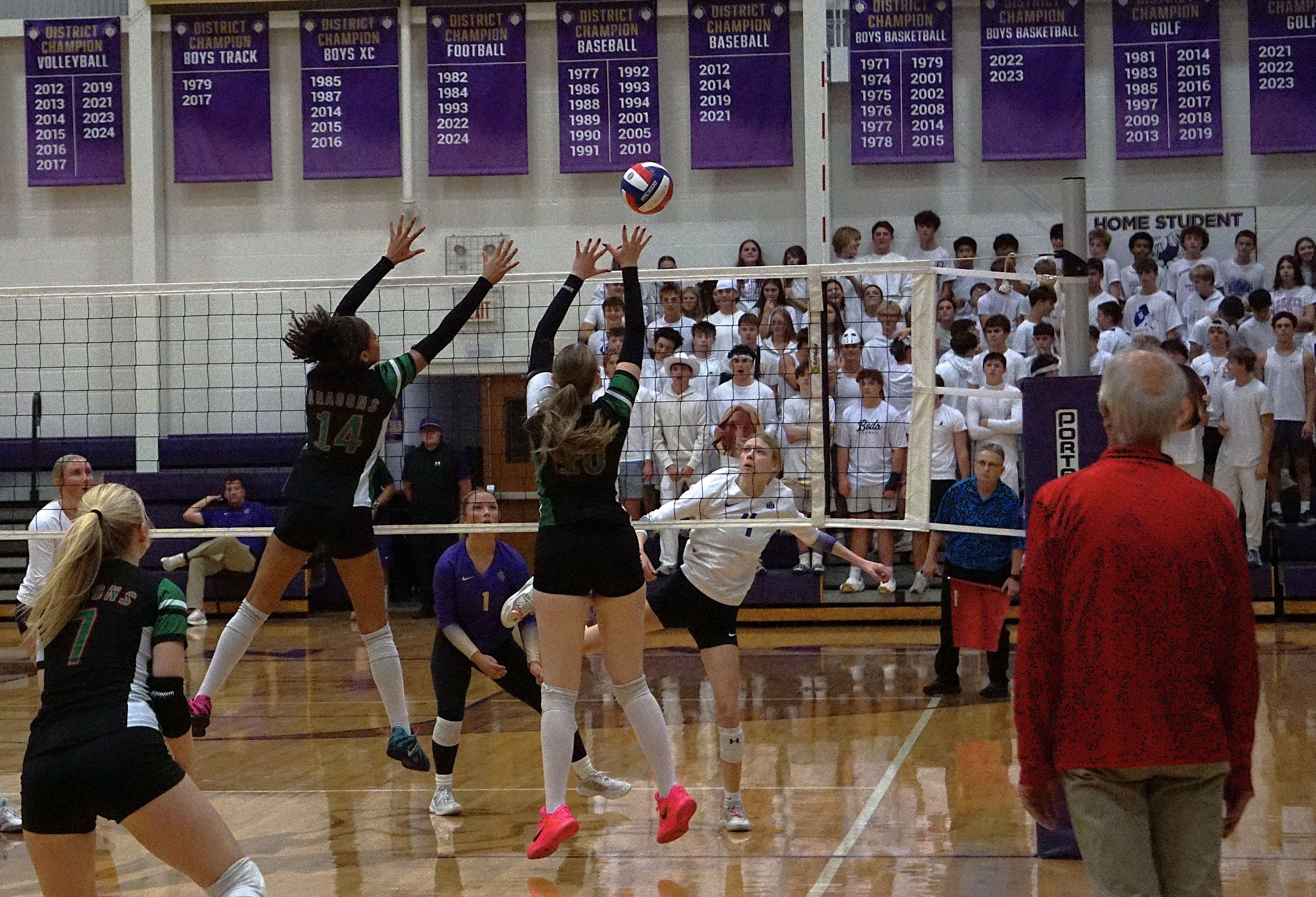 Mid-Buchanan's Devyn Admire and Myla Flinn form a wall against Bishop LeBlond/ Photo by Matt Pike