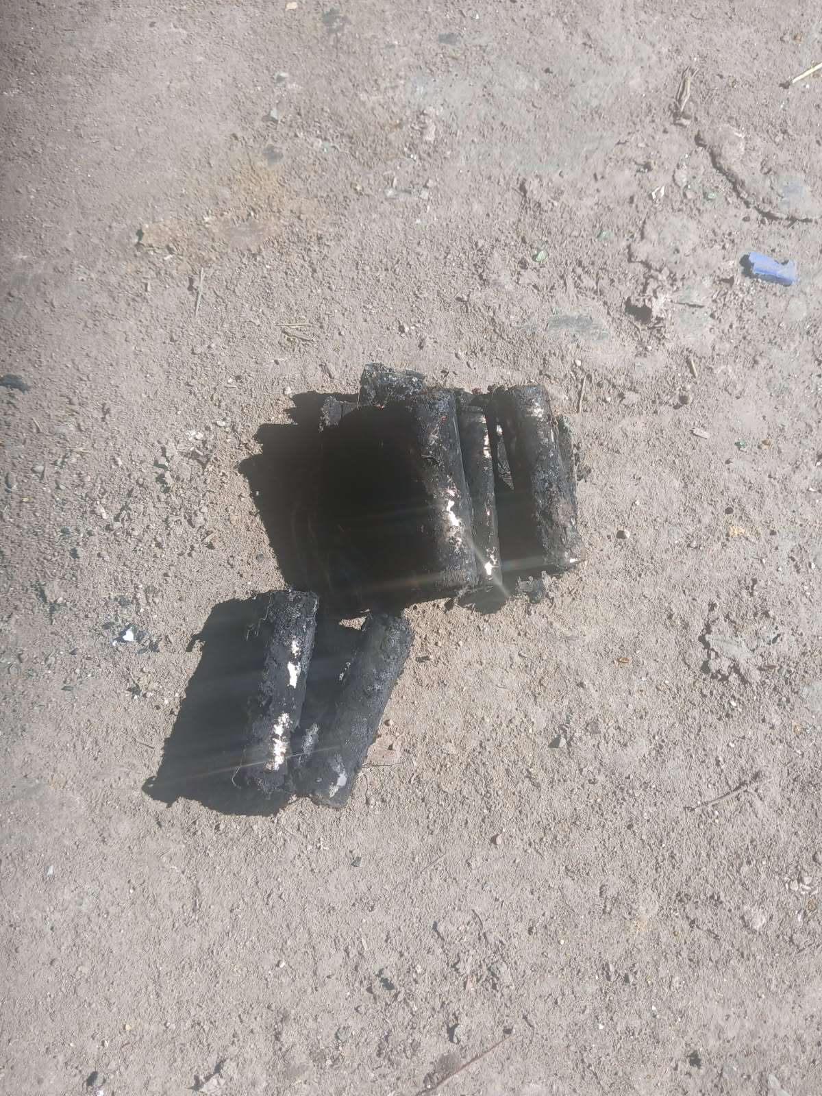A charged lump is all that's left of these lithium batteries that ignited in the baler at the City of Alliance Landfill.