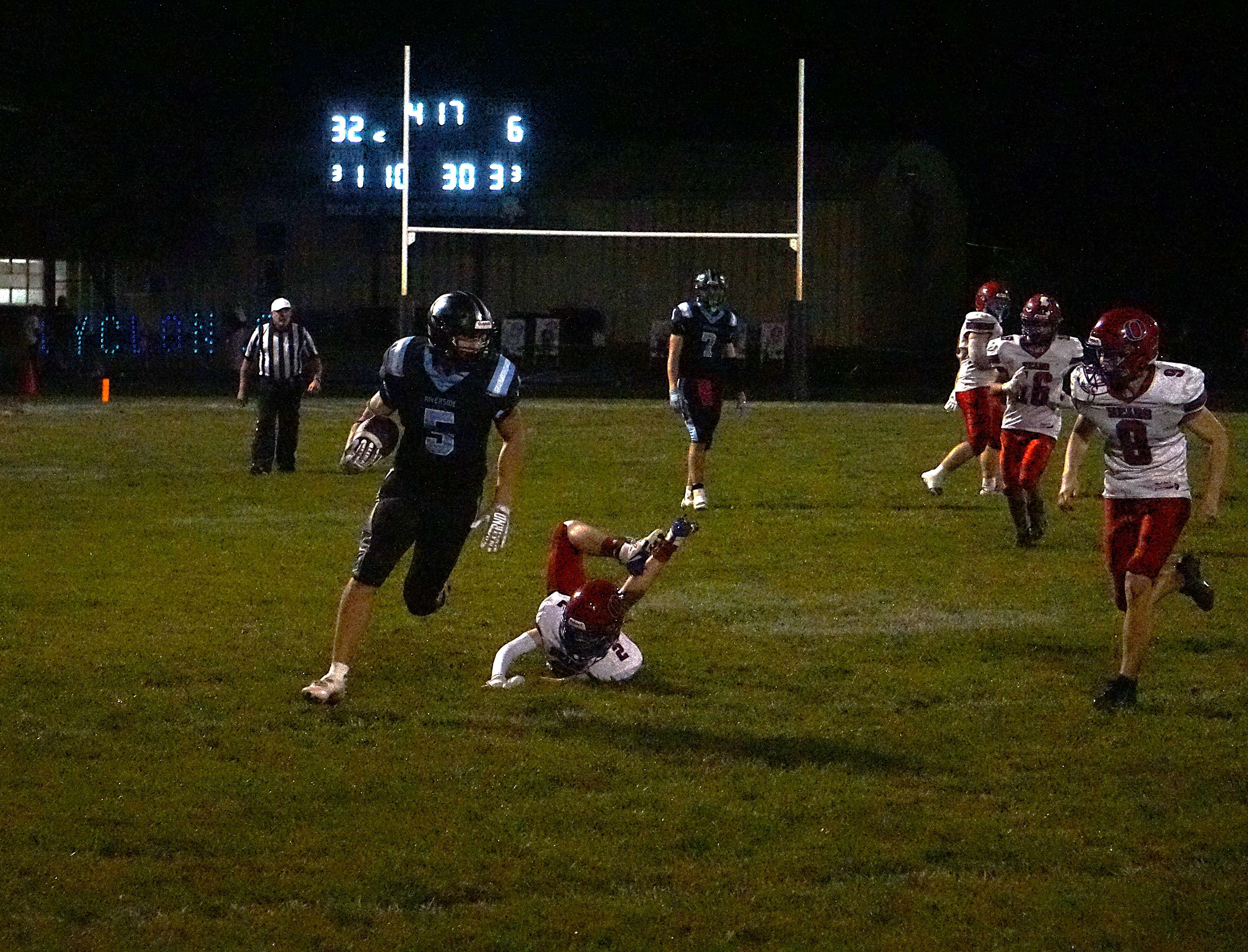 Charles Hewins breaks a third long touchdown run in the game/ Photo by Matt Pike