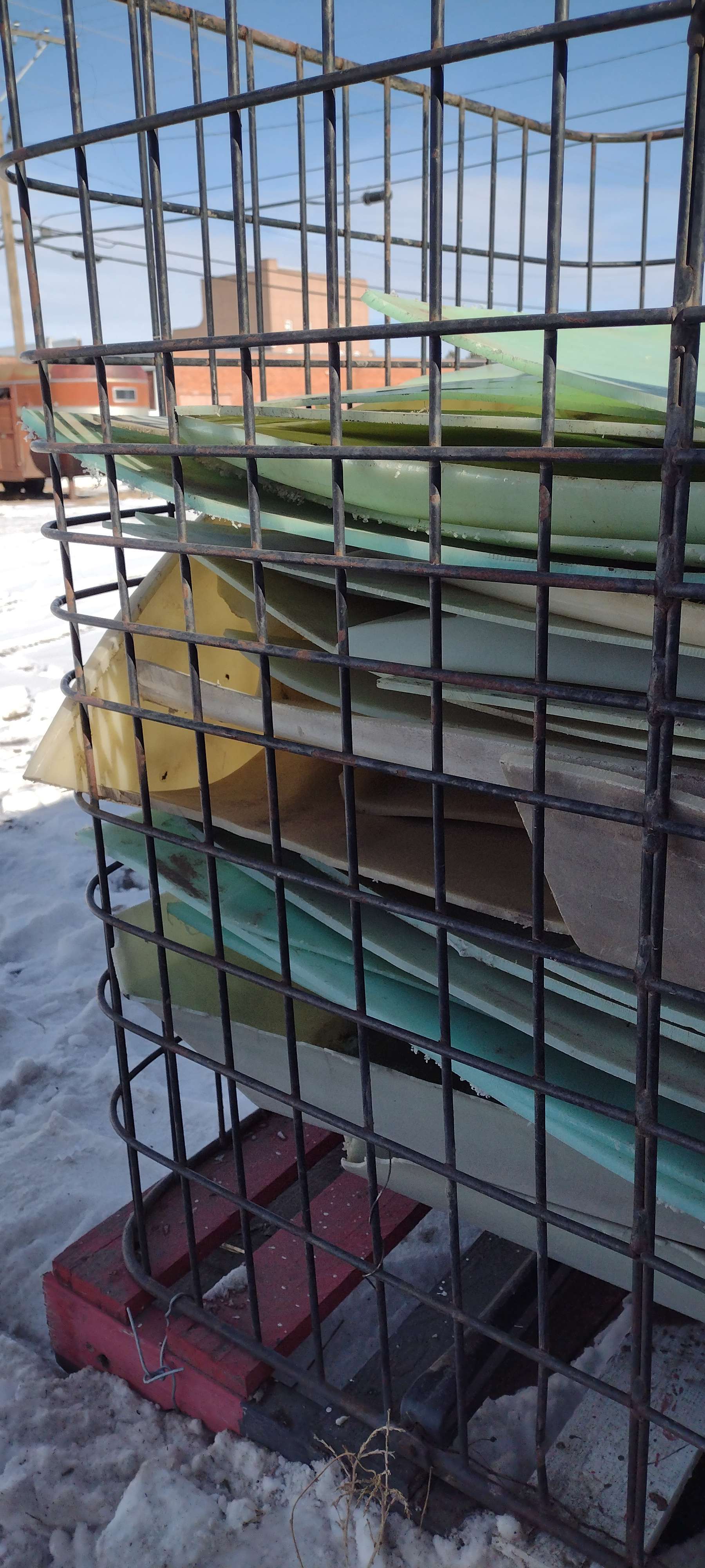 Stacked like chunks of peanut brittle, cut up No. 2 plastic chemical tanks are among materials accepted at KAB.