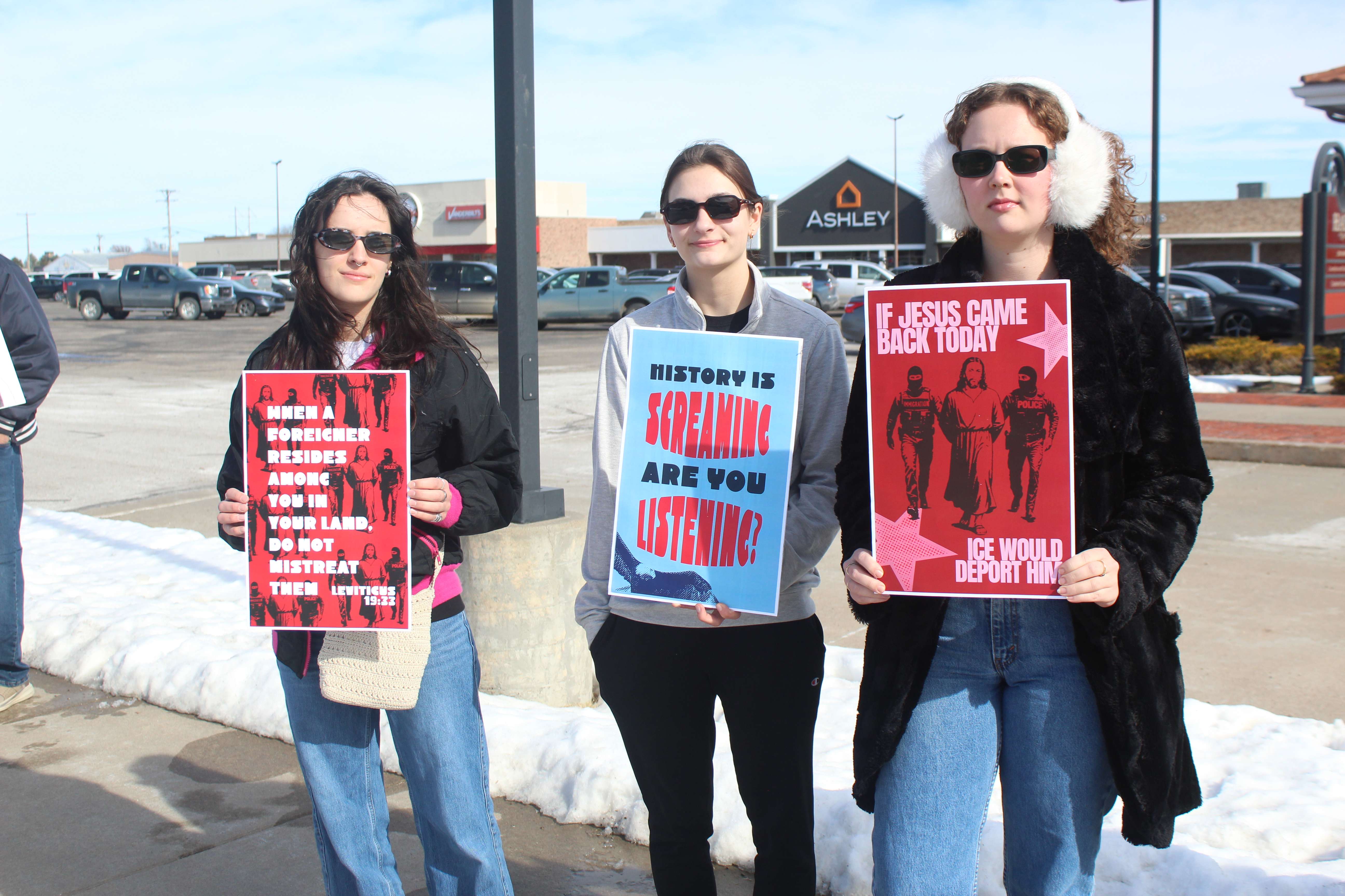 Protesters Sunday at 27th and Vine in Hays.&nbsp;Photo by Cristina Janney/Hays Post
