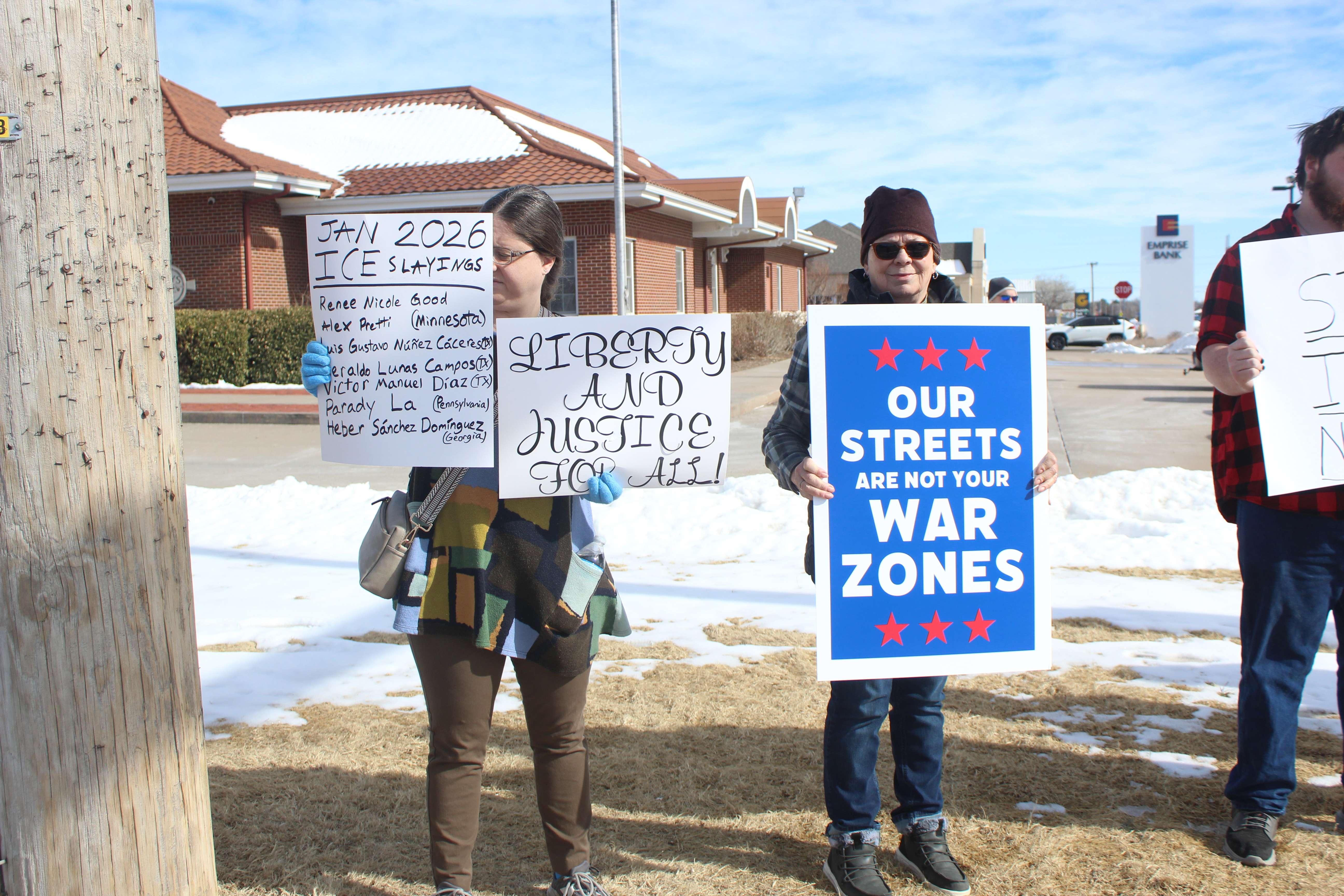 Stephanie Pfannenstiel, left, of Great Bend, said race, language and place of employment should not be reasons for ICE to detain people. Photo by Cristina Janney/Hays Post