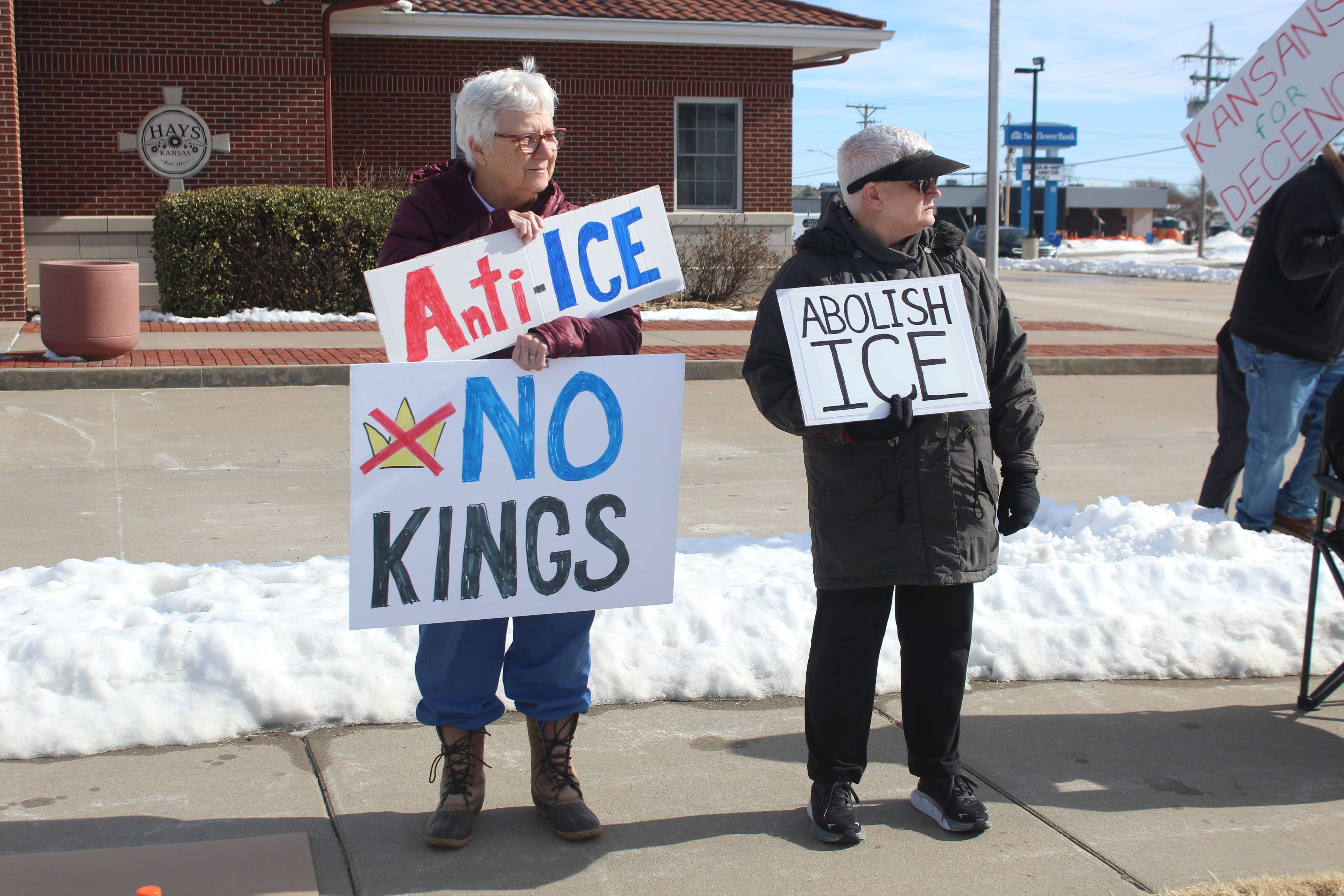 Protesters Sunday at 27th and Vine in Hays. Photo by Cristina Janney/Hays Post