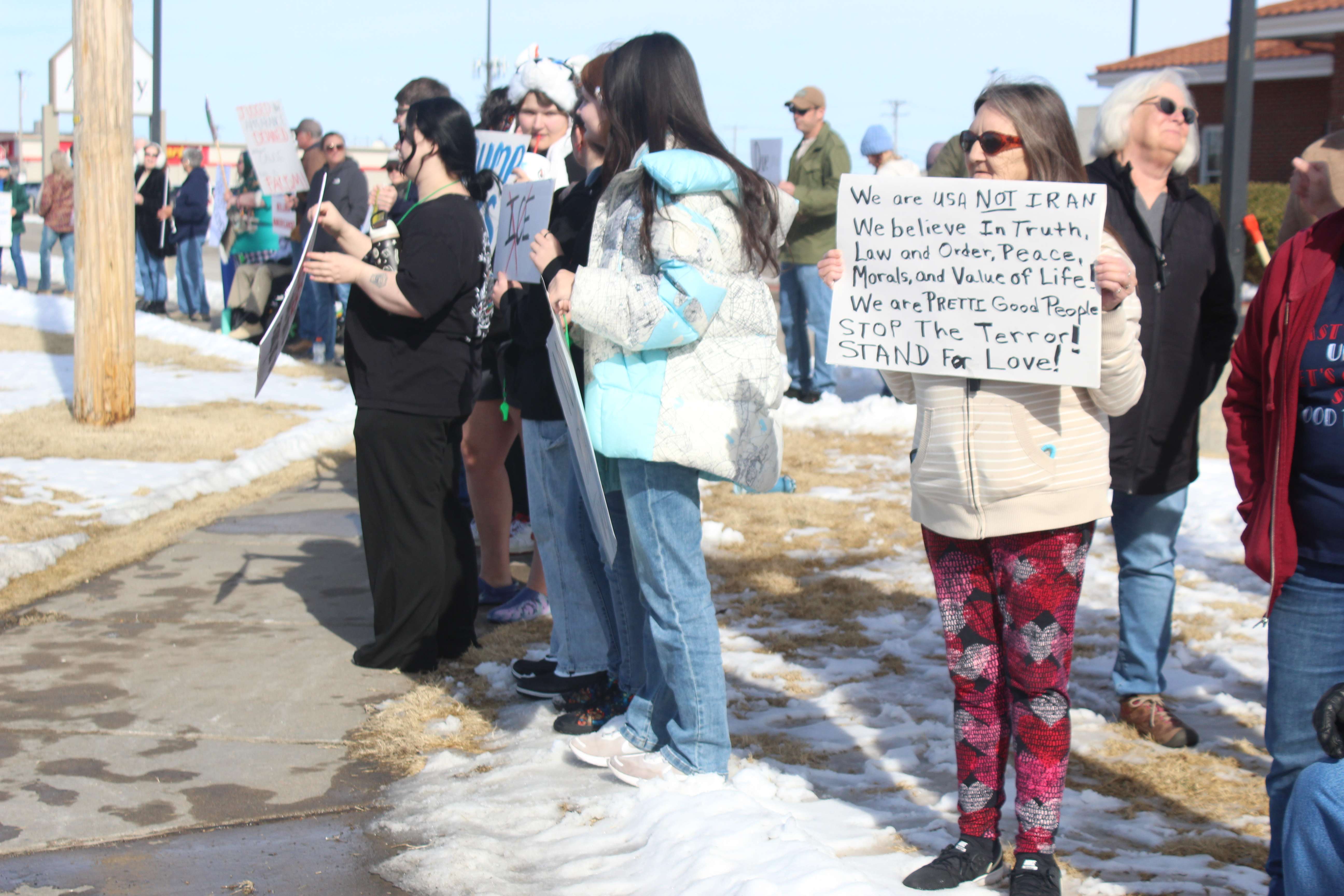 About 90 people attended an anti-ICE protest on Sunday at 27th and Vine Hays. Photo by Cristina Janney/Hays Post