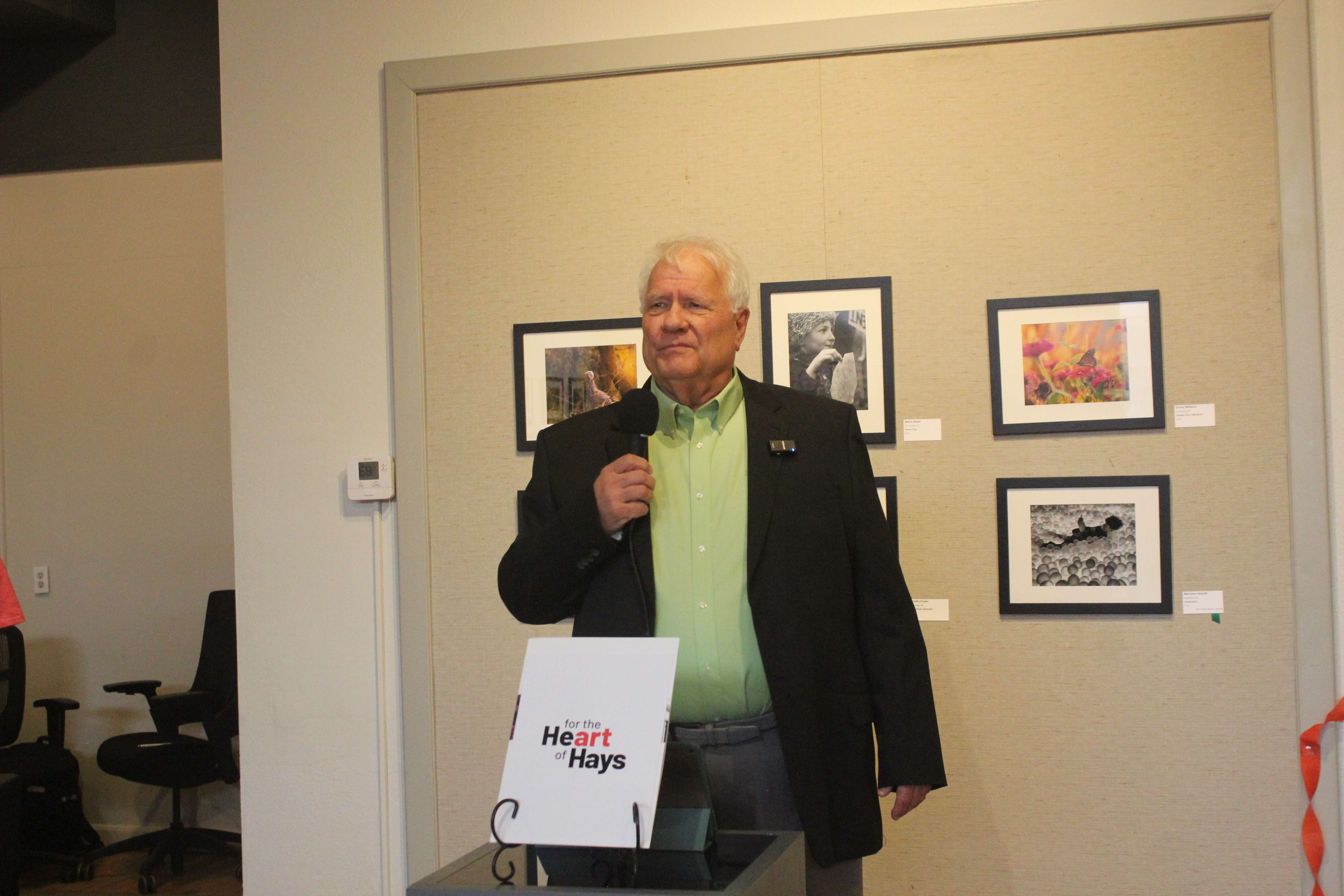 Joe Jeter, trustee of the Robert E. and Patricia A. Schmidt Foundation, provides some background on the art center.&nbsp;Photo by Cristina Janney/Hays Post