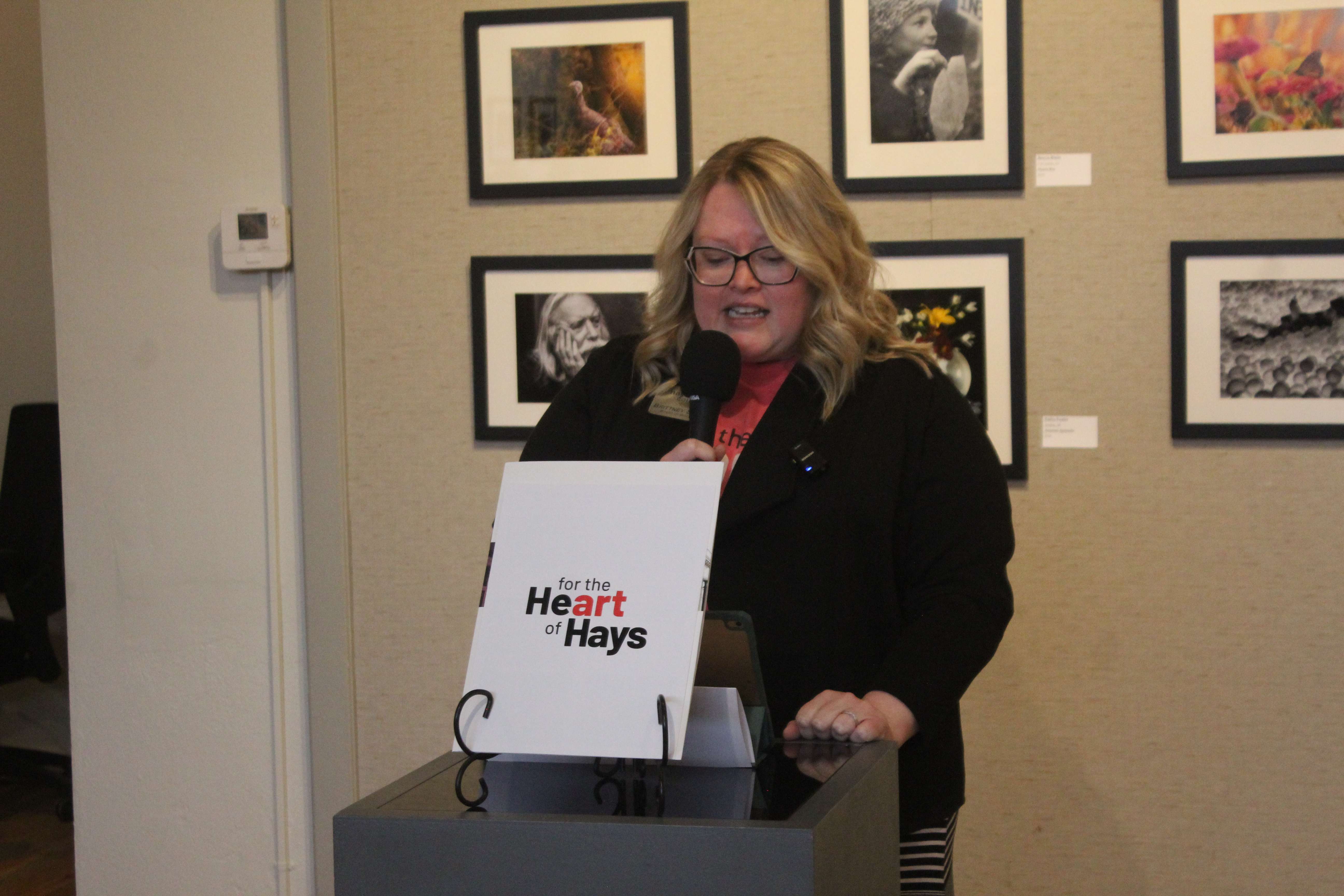 Brittney Squire, Hays Arts Council board president, discusses the arts center's renovation during a construction kick-off on Monday.&nbsp;Photo by Cristina Janney/Hays Post