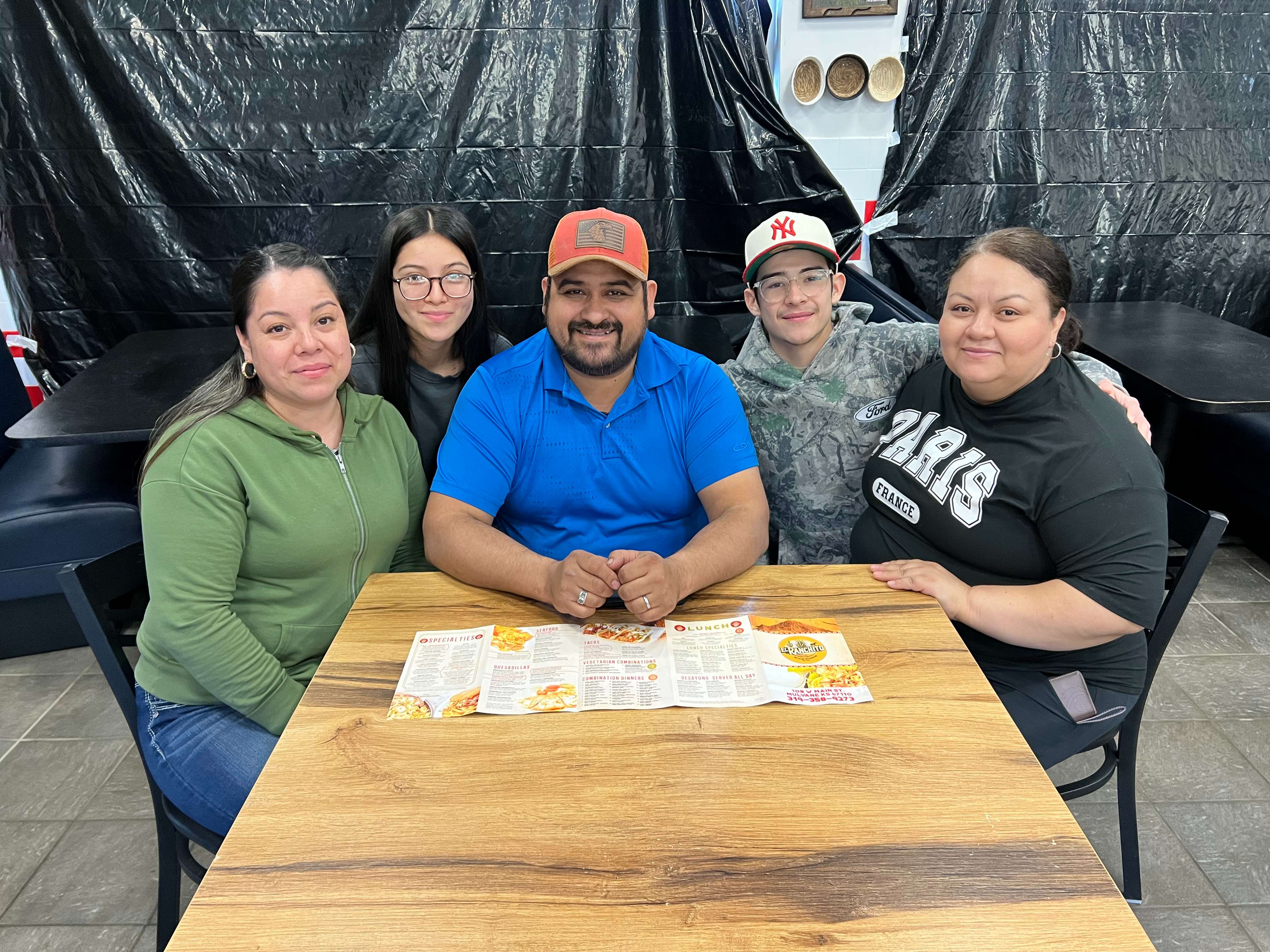 From left, Florentina Manriquez, Melany Manriquez, Jose Manriquez, Luis Manriquez and Lety Manriquez pose inside El Ranchito Mexican Cuisine in Hutchinson. The family plans to open the Guanajuato-inspired restaurant later this month at 2223 N. Lorraine St. (Hutch Post photo by Sean Boston)