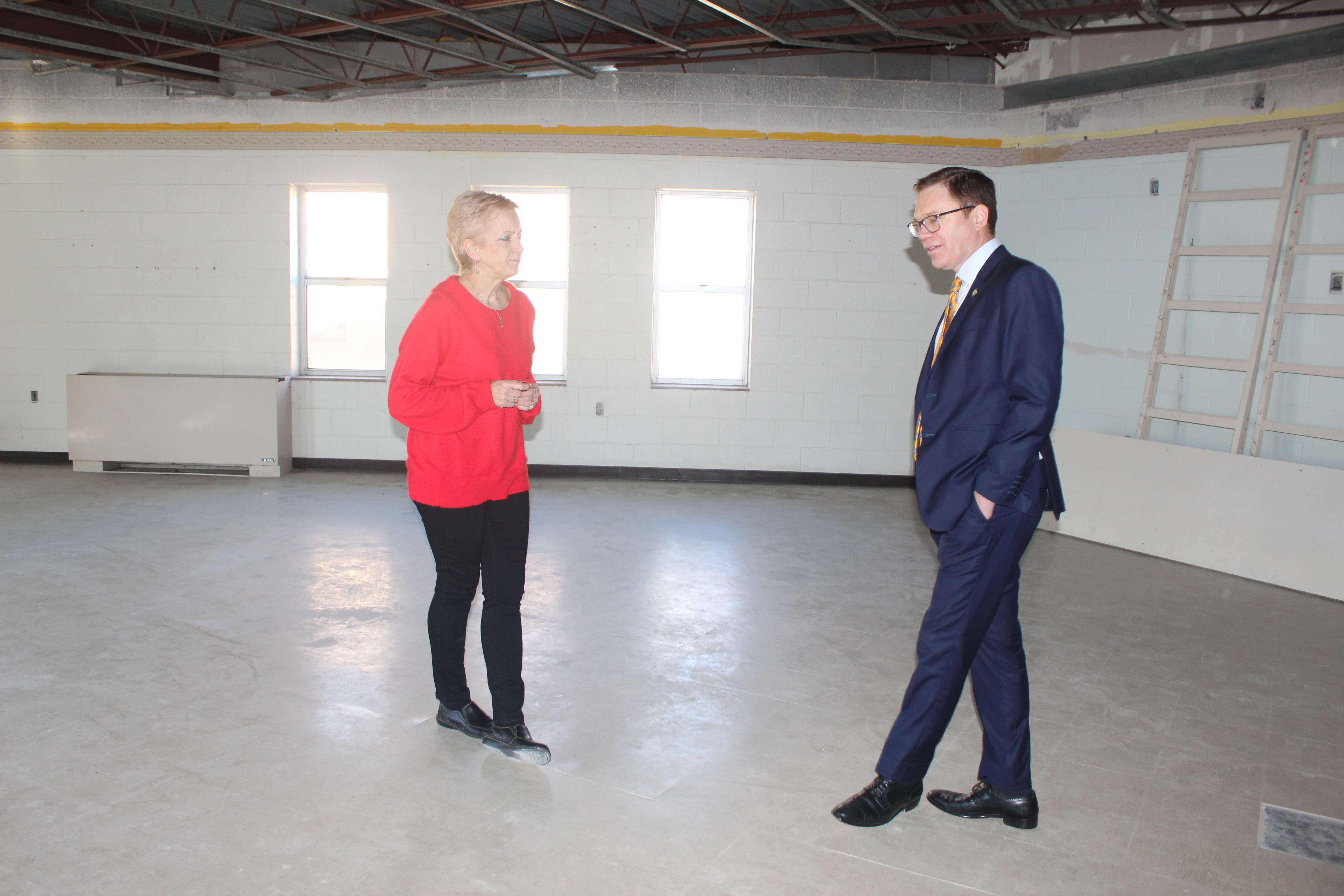 Dreiling and Toland in an area of St. John's Place that the Victoria Community Coalition hopes to renovate into a commercial kitchen.&nbsp;Photo by Cristina Janney/Hays Post