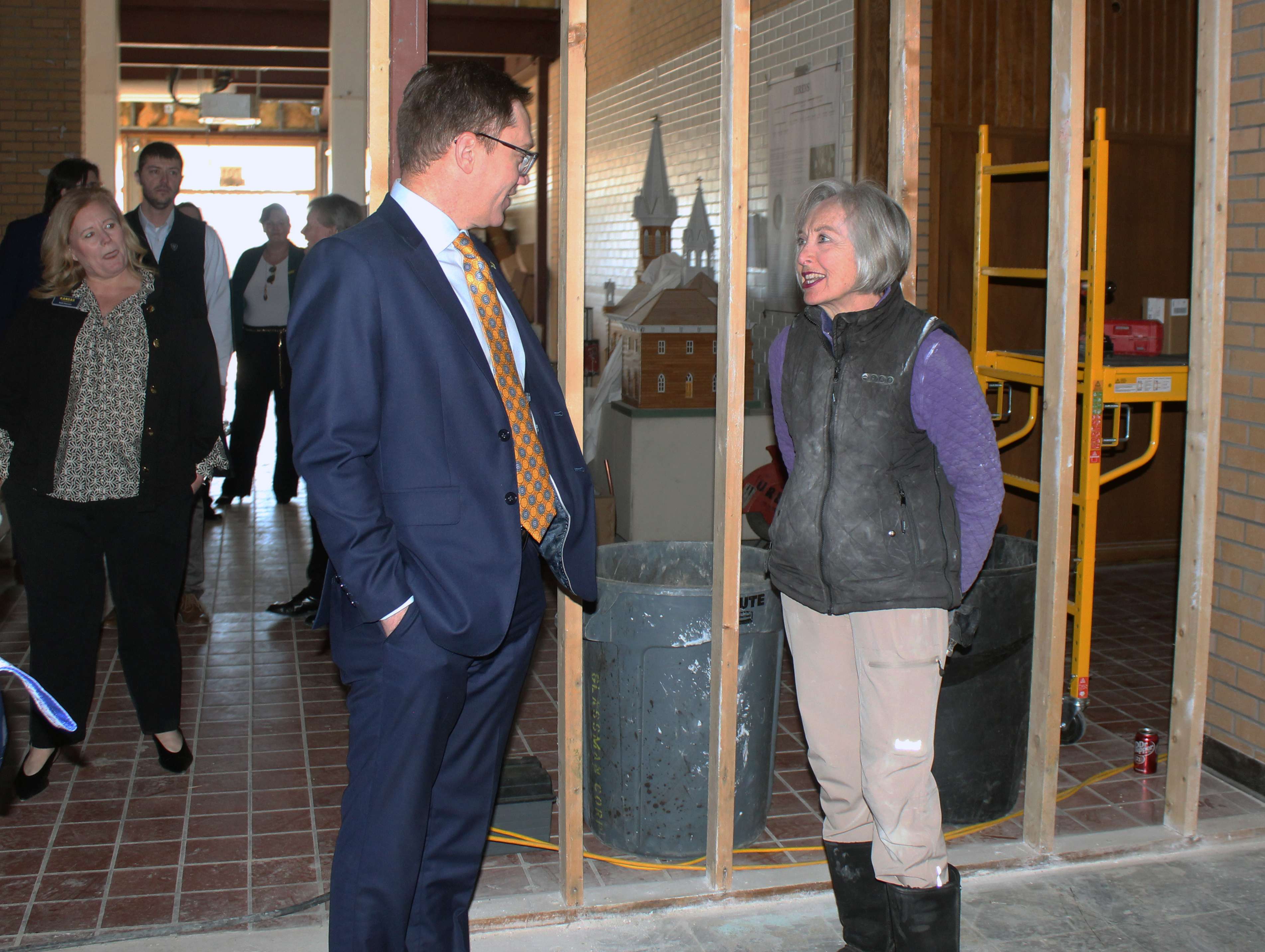 Toland, right, and&nbsp;Mary Kay Schippers, left, historical society board president, discuss the renovation work at St. John Place for the Ellis County Historical Society satellite campus.&nbsp;Photo by Cristina Janney/Hays Post