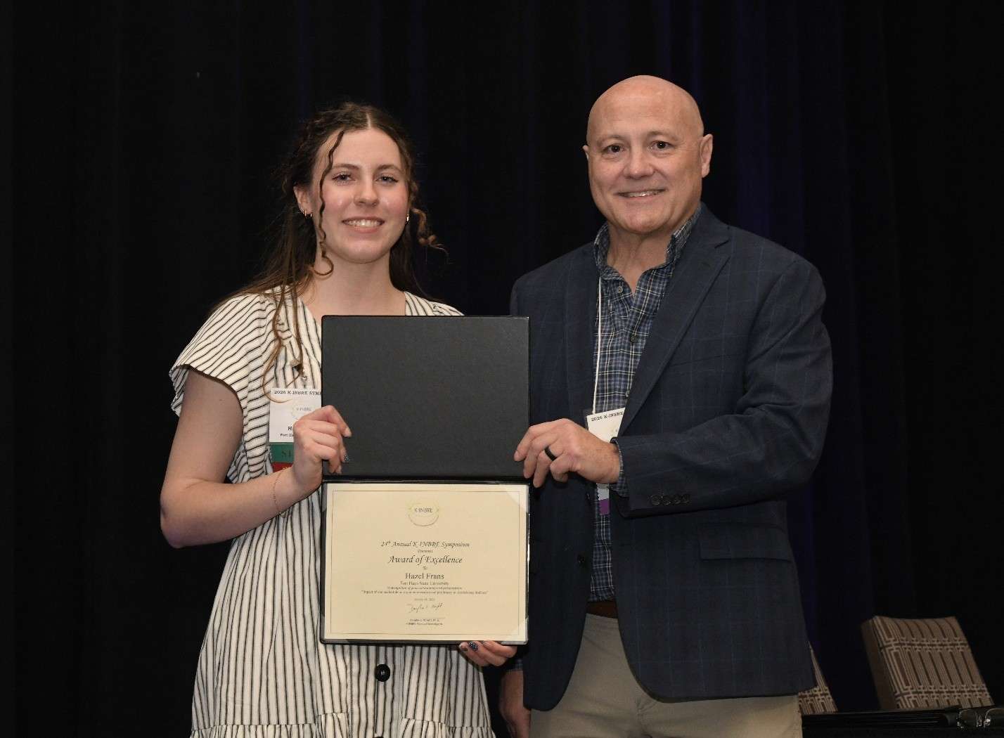 Hazel Frans, Oral Presentation Winner, pictured with Dr. John Stanford of Kansas School of Medicine. Courtesy photo