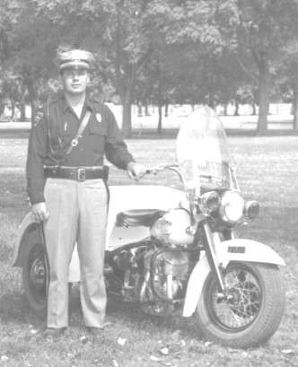 Former Hays Police Chief Lawrence "Jug" Younger with a motorcycle. Courtesy photo