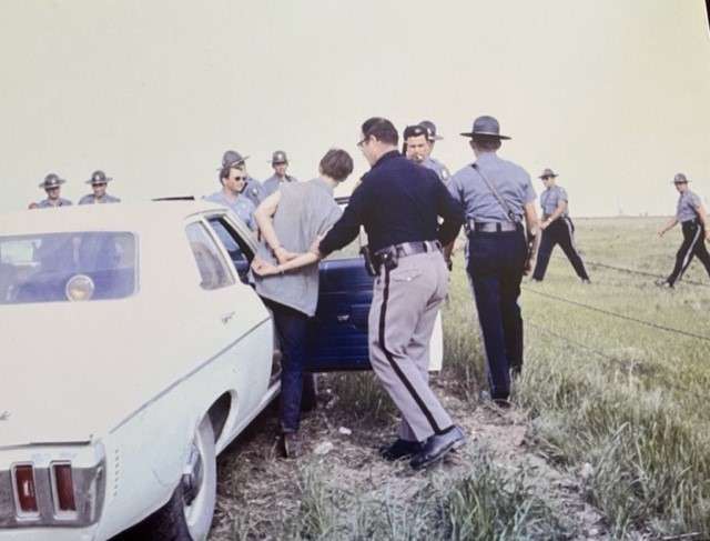 Former Hays Police Chief Lawrence "Jug" Younger making an arrest. Courtesy photo