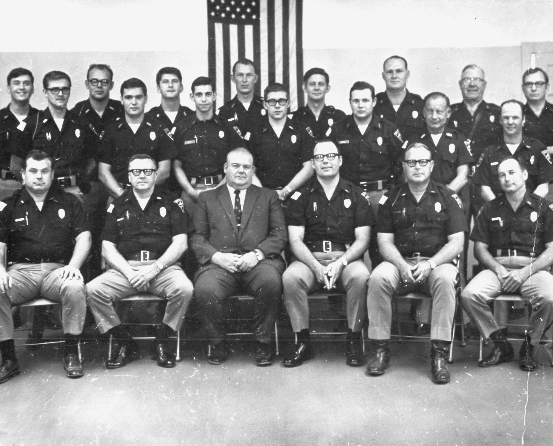 Former Hays Police Chief Lawrence "Jug" Younger (front row, center right) surrounded by other officers. Courtesy photo