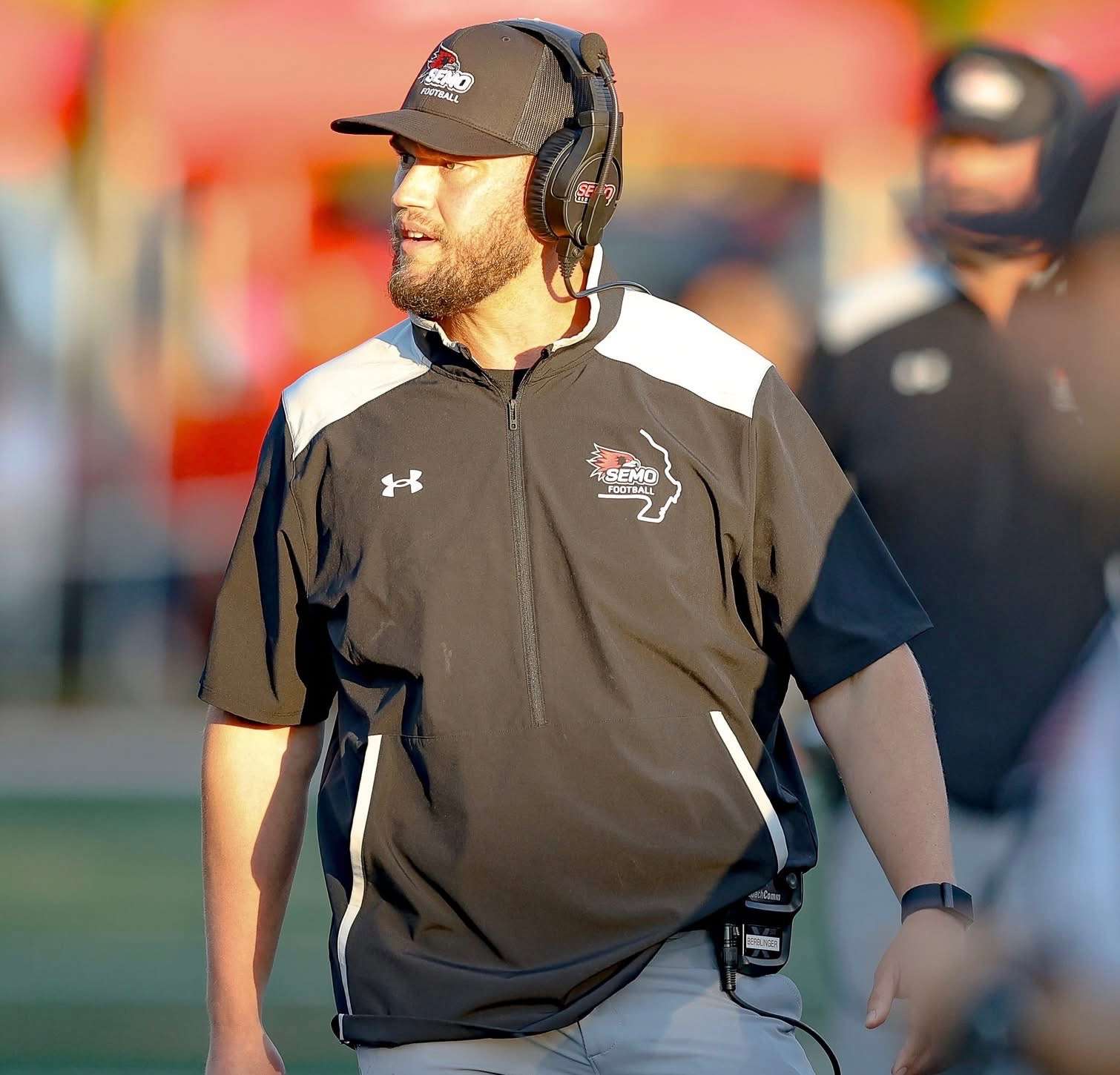 Southeast Missouri State assistant coach Luke Berblinger watches the field during a Redhawks game in Cape Girardeau, Mo. Berblinger served in multiple roles at SEMO, including recruiting coordinator and position coach, before returning to Reno County to become Hutchinson High School’s head football coach. (Courtesy photo/Southeast Missouri State Athletics)