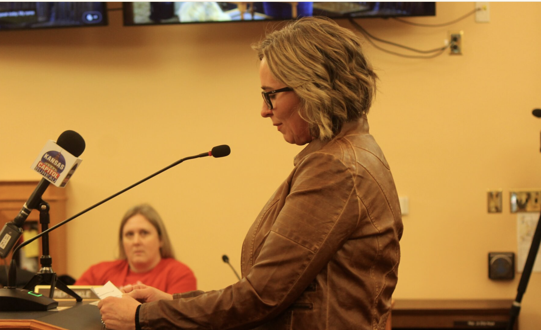  Kansas nurse Lacey Grogan testifies to a Kansas House committee in support of a bill making sweeping changes to administrative power of the Kansas State Board of Nursing (Photo by Grace Hills for Kansas Reflector)
