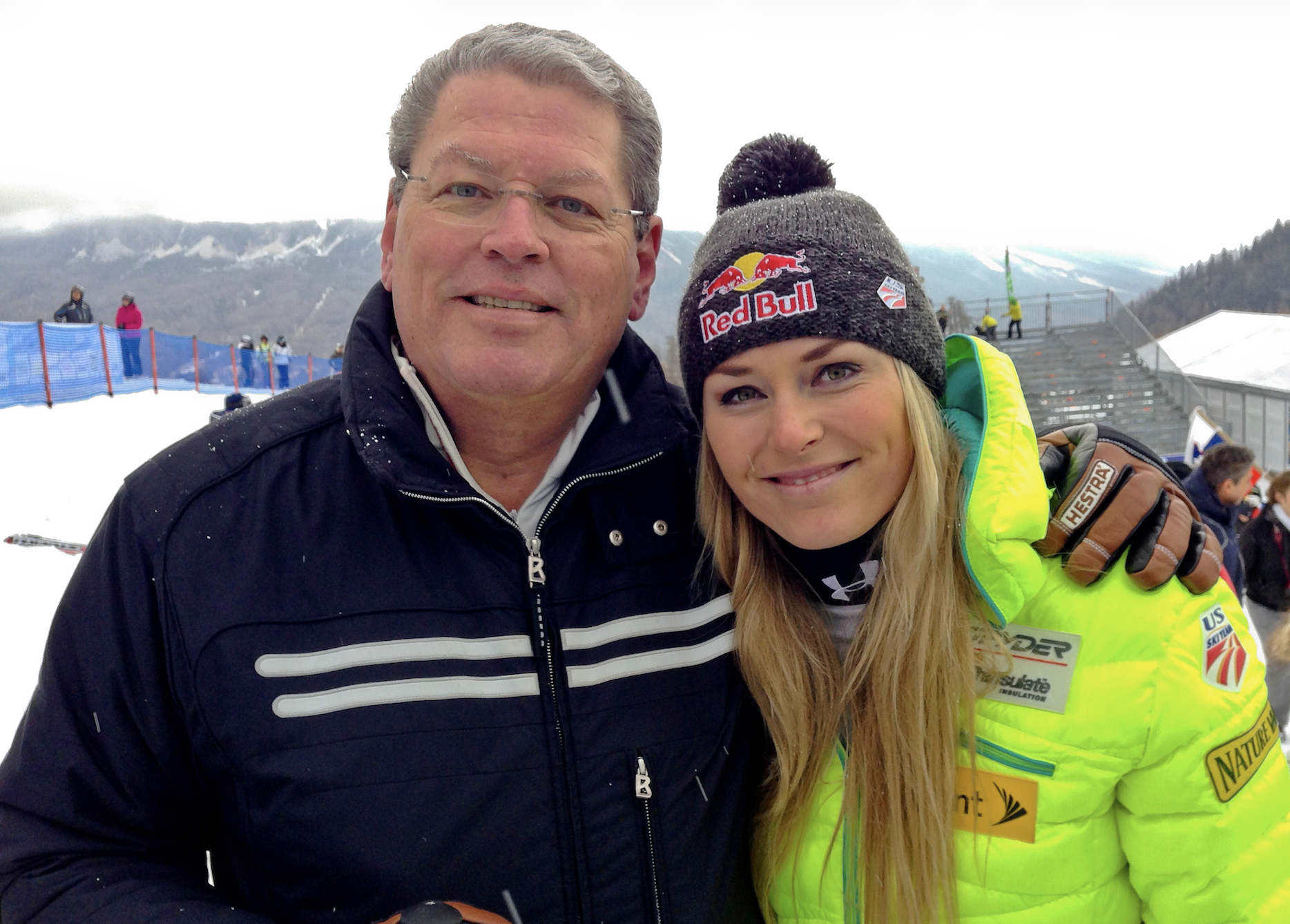 FILE - United States' Lindsey Vonn, right, poses for photographs with her father Alan Kildow at the end of an alpine ski, women's World Cup downhill race, in Cortina d'Ampezzo, Italy, Friday, Jan. 16, 2015. (AP Photo/Andrew Dampf, File)