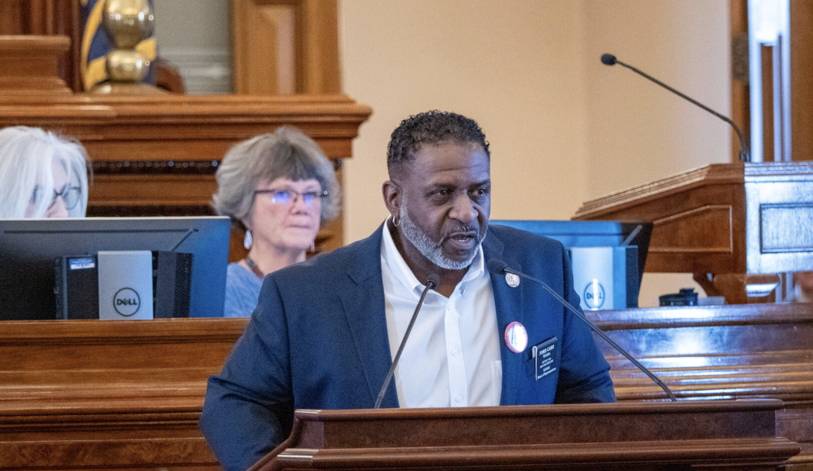  Rep. Ford Carr, a Wichita Democrat, attempts to insert Malcolm X's name into a Republican-driven resolution honoring conservative activist Charlie Kirk. He appears here on the House floor on Jan. 28, 2026, in Topeka, Kansas. (Photo by Sherman Smith/Kansas Reflector)