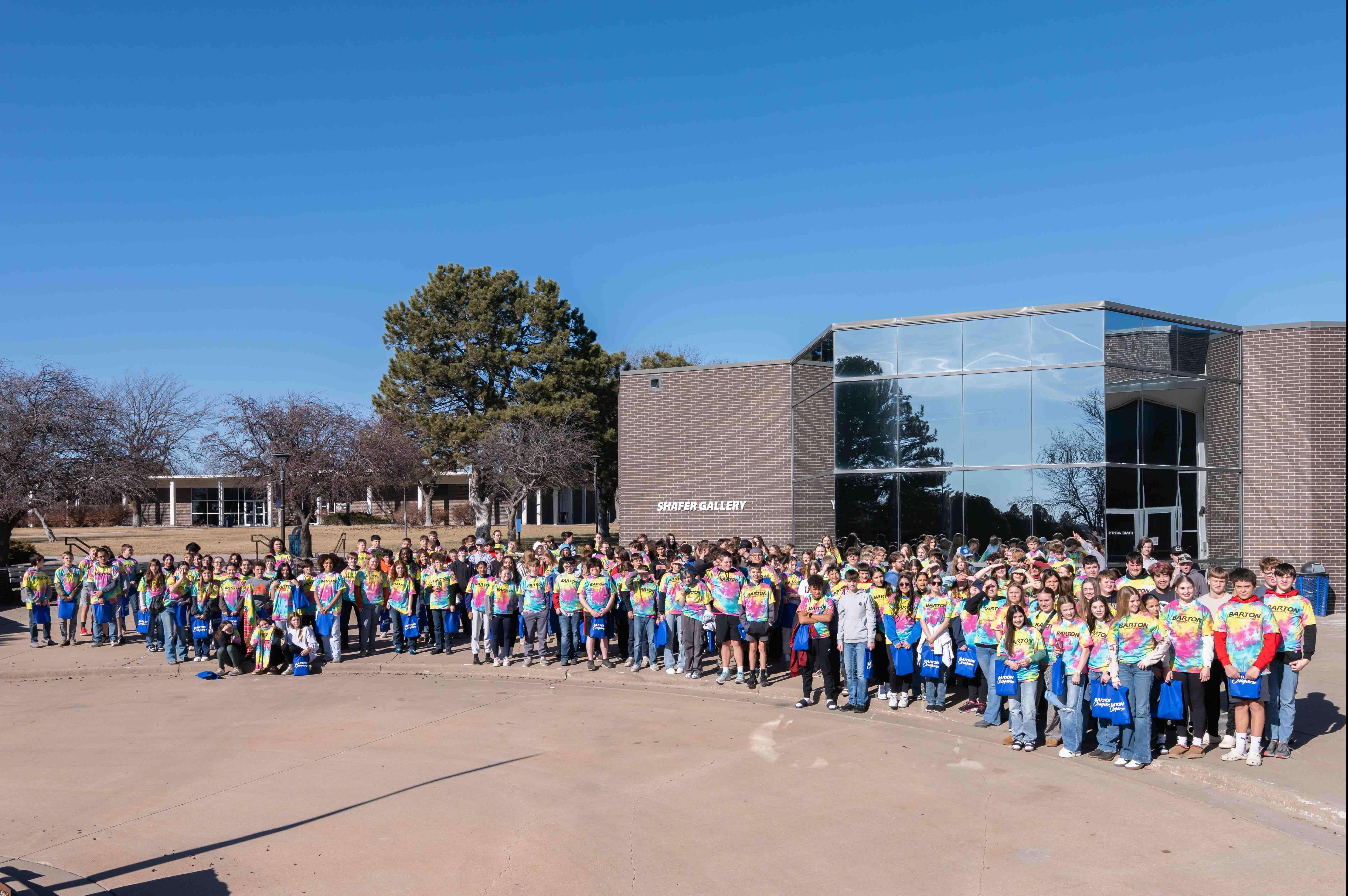 Career Fair attendees gather outside the Shafer Gallery at Barton Community College Friday during the 11th Annual Career and Technical Education Fair, exploring career pathways and participating in hands-on sessions.