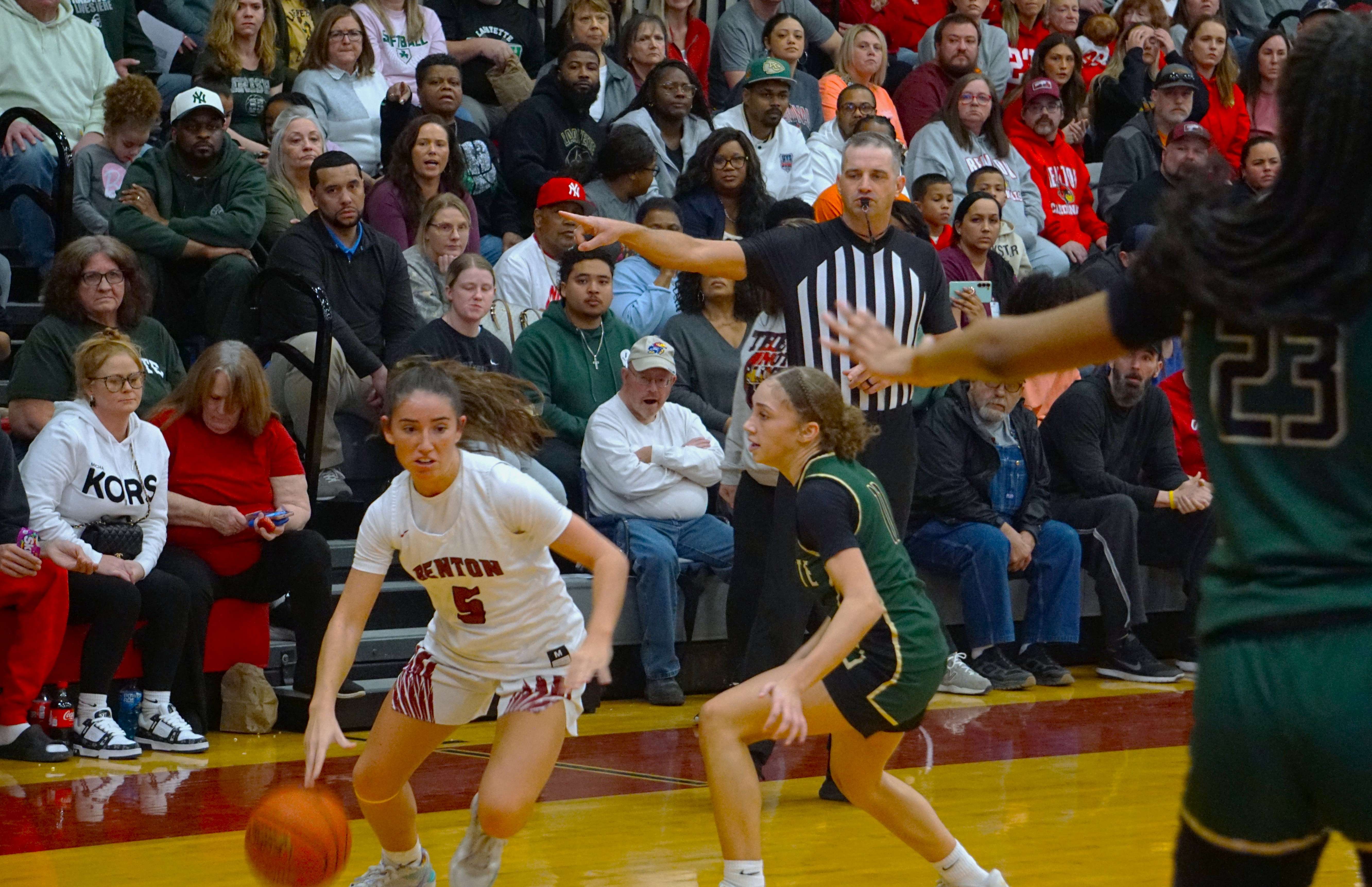 Eliana Arambula (5) dribbles around Lafayette's Rozlyn McDevitt (11)/ Photo by Matt Pike
