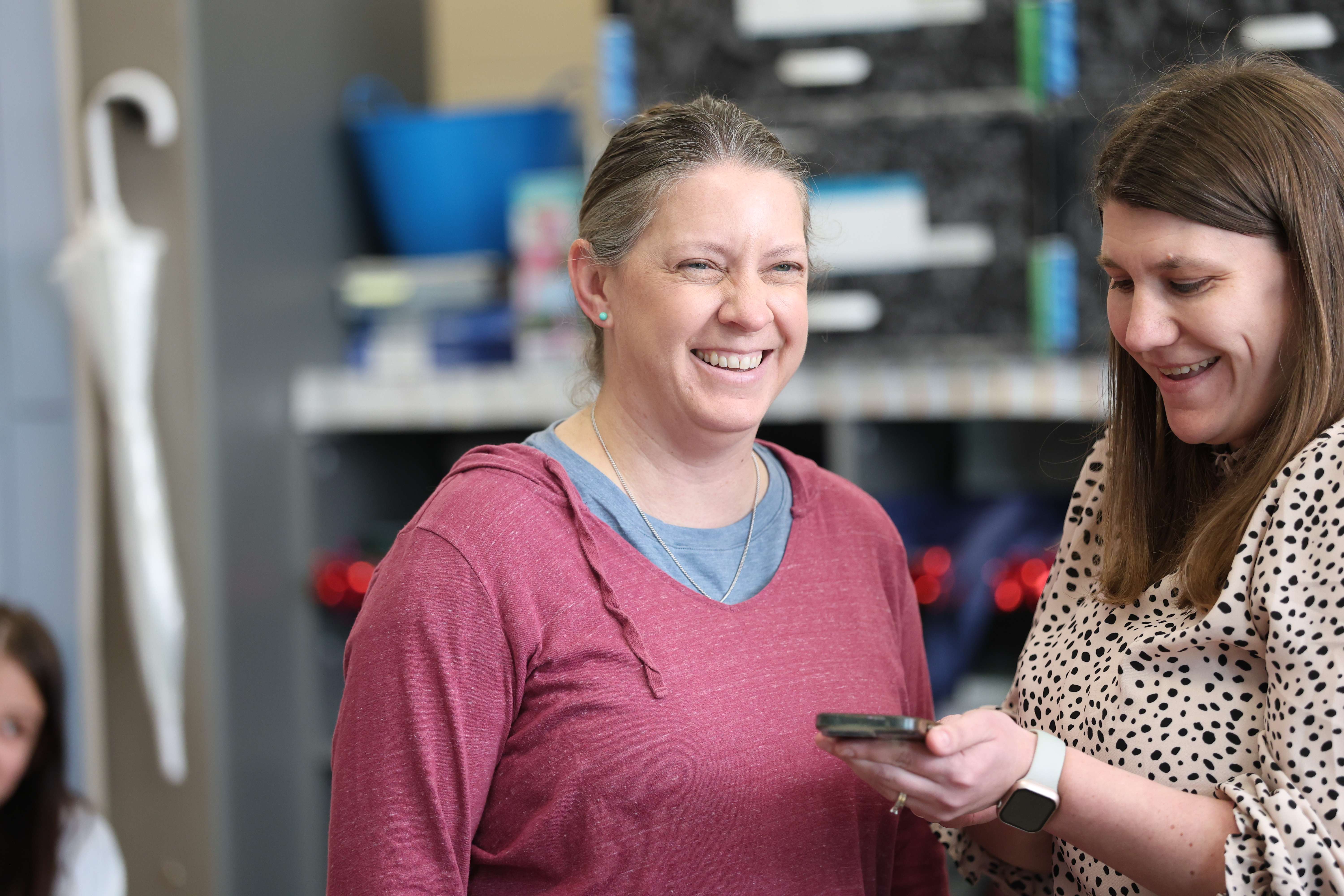 Pictured: Chandler and FRE principal, Kimbre Smice, receiving the phone call from Emporia State on Tuesday, letting her know she was named one of seven statewide honorees.&nbsp;