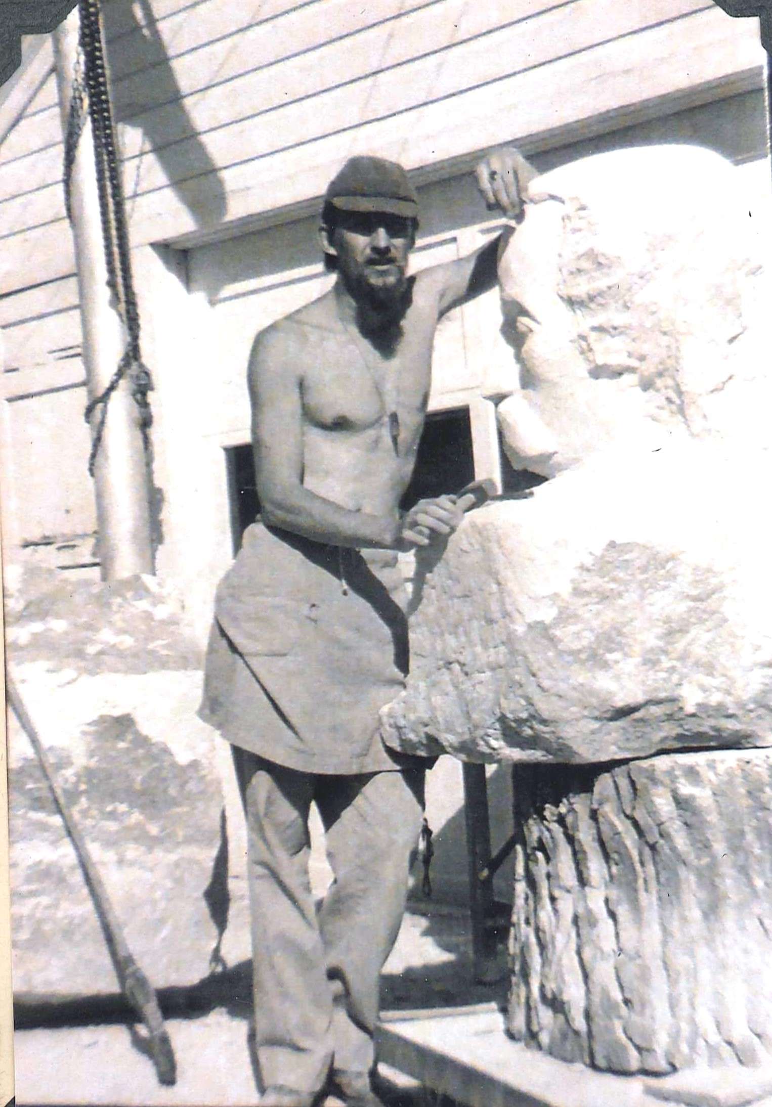 Felten with one of his massive limestone sculptures. Courtesy photo