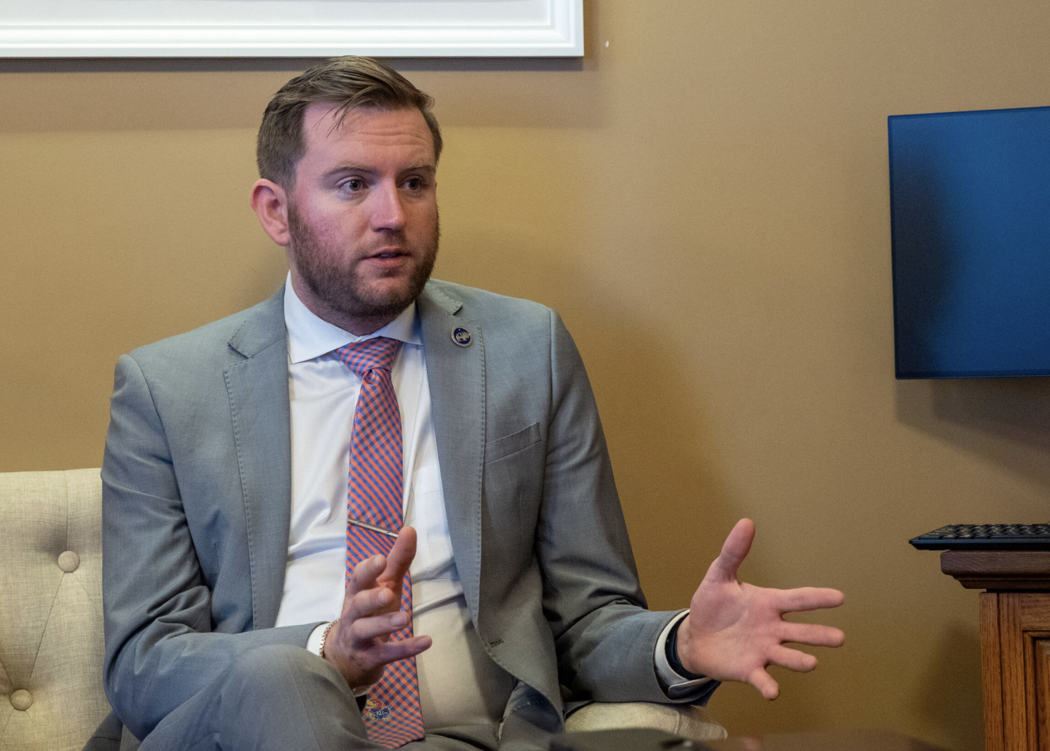 House Minority Leader Brandon Woodard talks to reporters during a Jan. 15, 2026, news conference in Senate Minority Leader Dinah Sykes’ office at the Statehouse in Topeka. (Photo by Sherman Smith/Kansas Reflector)
