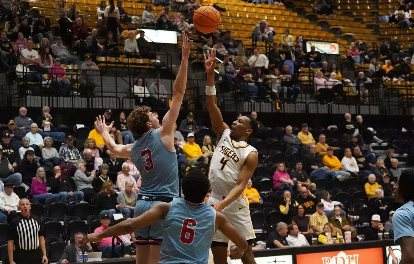 Fort Hays State guard Jahvari Martino (4) attempts a shot over Newman's Thatcher McClure (3) in the second half of an NCAA college basketball game on Saturday, February 14, 2026 in Hays, Kan. (FHSU Athletics photo/Gillian Lynch)
