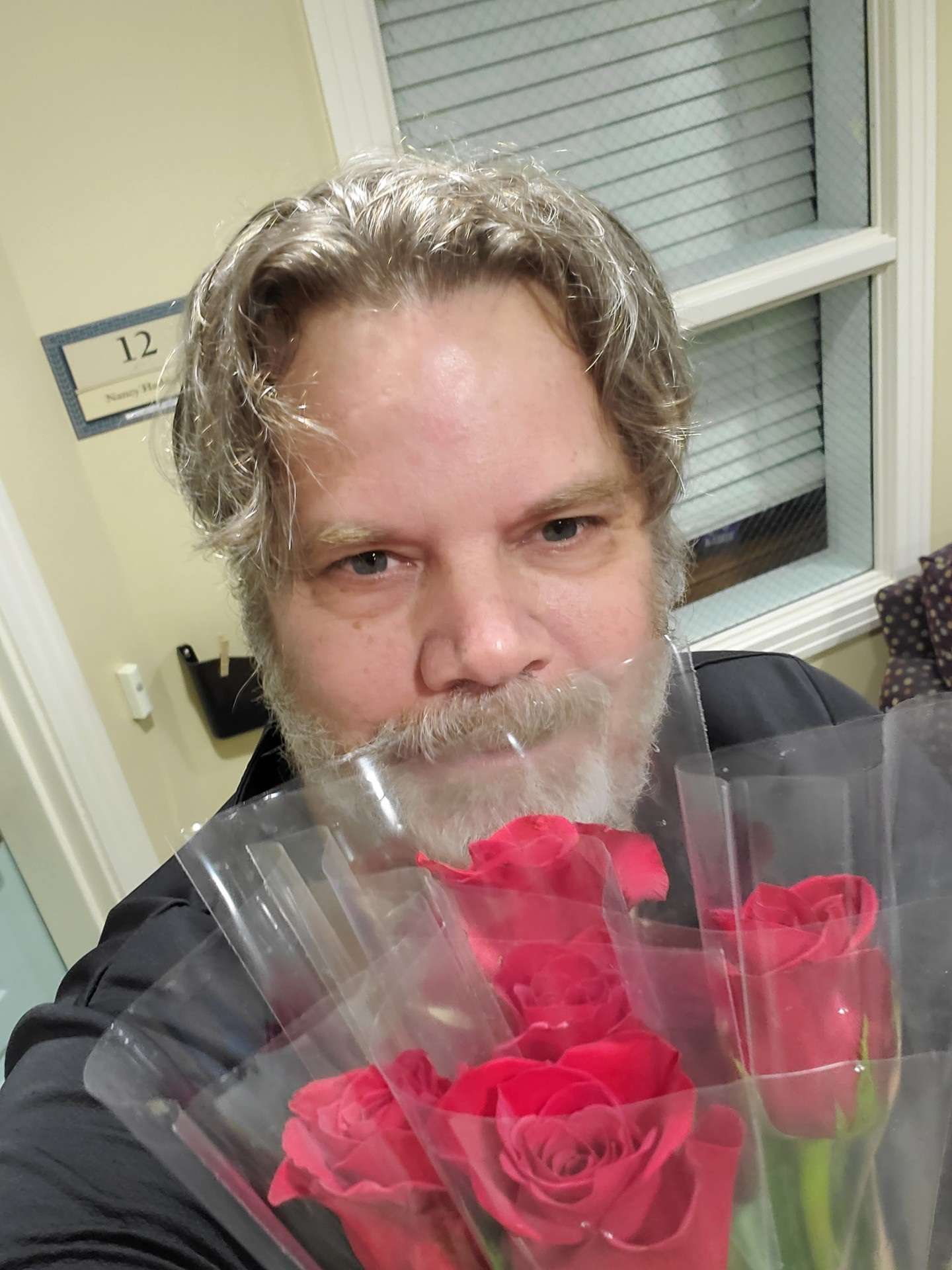 Power Hits 97.5 air personality Rick Thomas was among those who presented roses..jpg