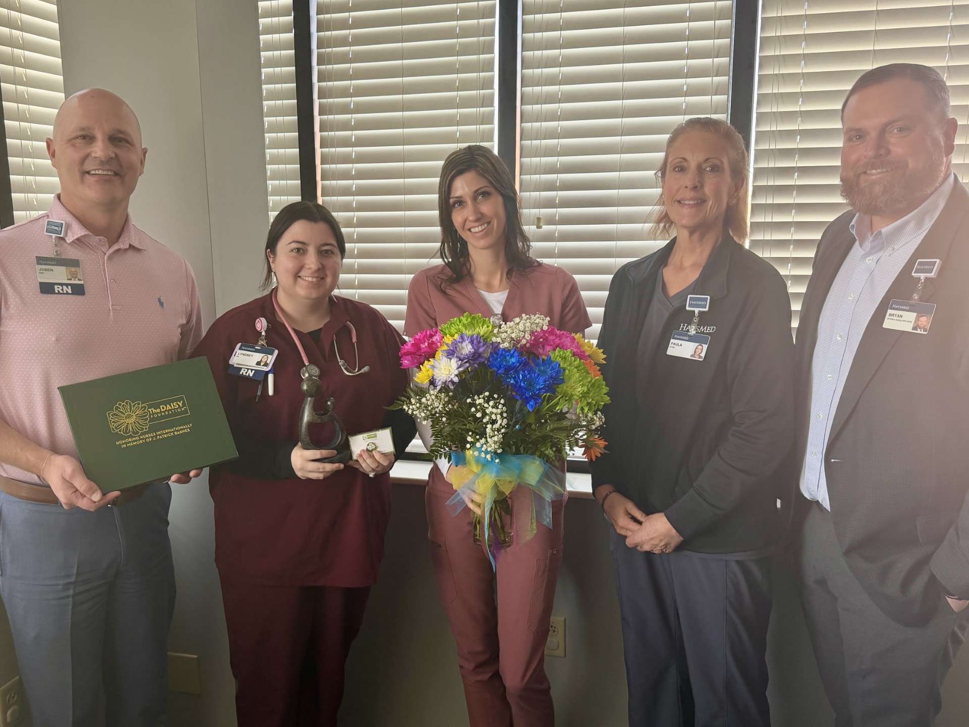 From left to right: Joben Rieth, Vice President of Patient Care Services and Chief Nursing Officer, Lyndsey Day, RN, DAISY Award recipient, Anne Marie Hager, APRN, Paula Bitter, APRN, and Bryan Brady, Vice President of Physician Practice Administration &amp; Ancillary Services. Photo courtesy HaysMed