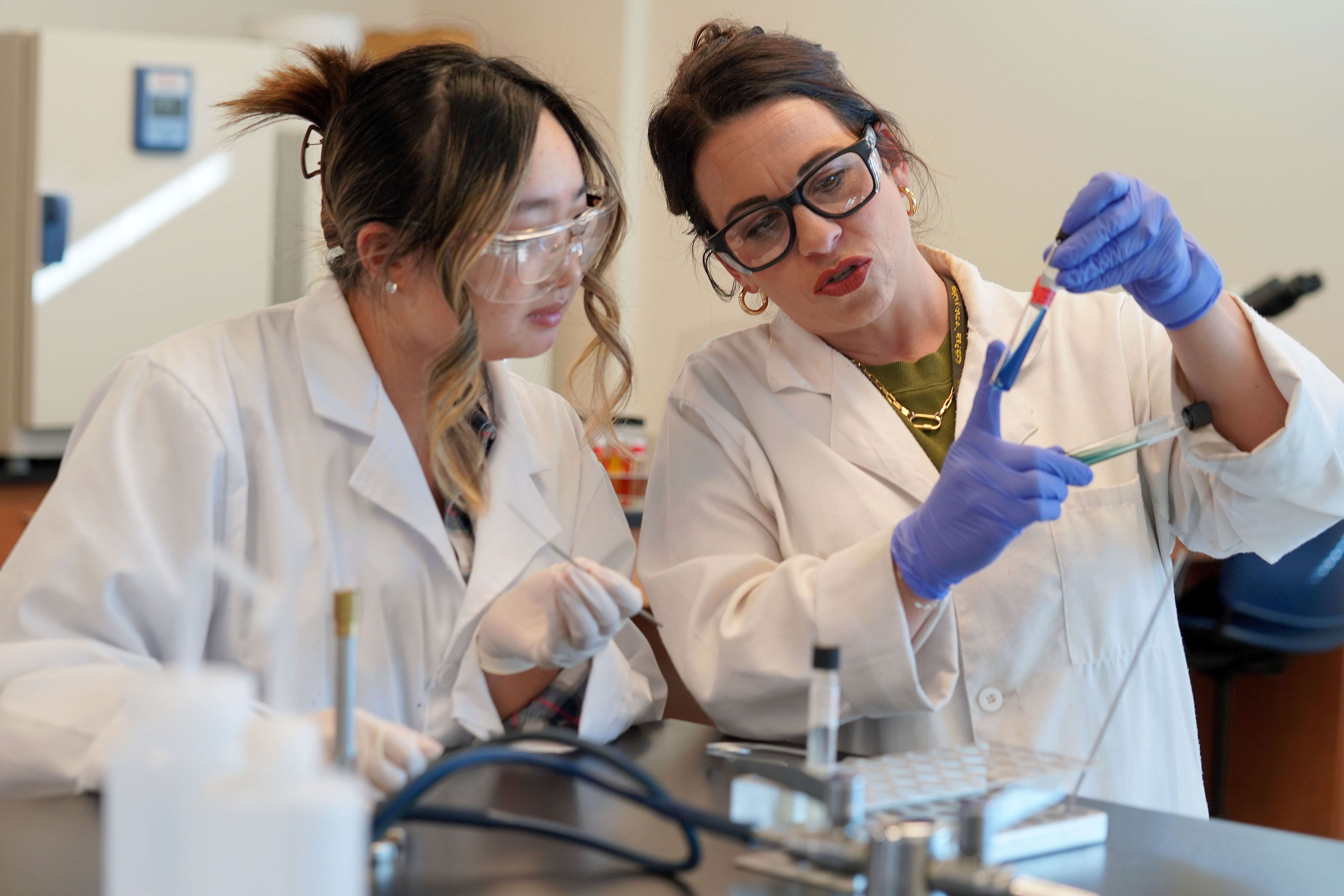 Mid-Plains Community College Biology Instructor HaLea Messersmith works with student Cailey Nutt during a recent lab in the Health and Science Center on North Platte Community College South Campus. March 1 is the priority deadline to turn in a scholarship application for the MPCC 2026-27 school year.