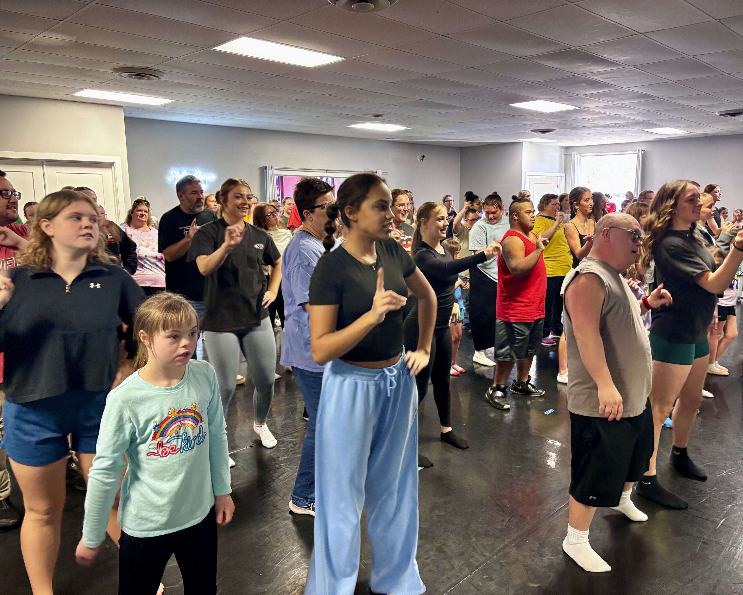 The large group rehearsing for the upcoming Dancing Together for Developmental Services of Northwest Kansas. Photo by Tony Guerrero/Hays Post