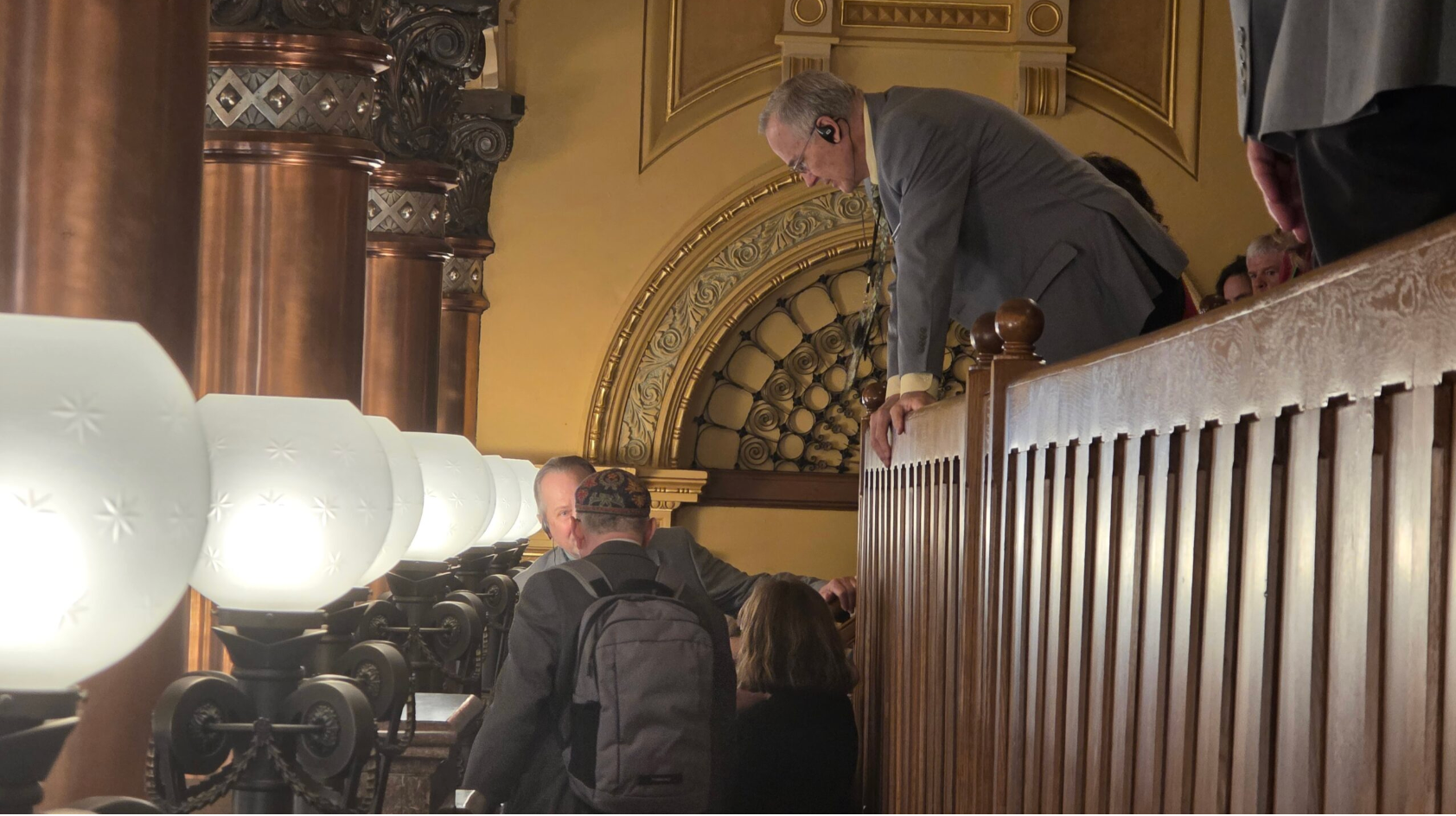 Kansas Senate security personnel remove Rabbi Moti Rieber from a Senate hearing after. he shouted, “Shame on you” when the Senate overturned the veto of a “bathroom bill.” (Photo by Morgan Chilson/Kansas Reflector)