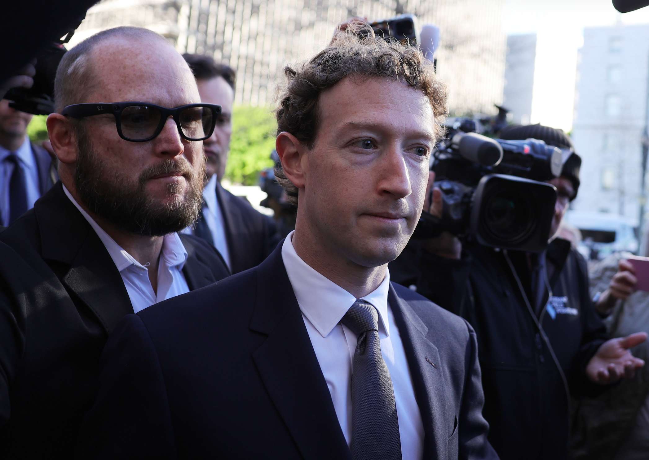 Meta CEO Mark Zuckerberg arrives for a landmark trial over whether social media platforms deliberately addict and harm children, Wednesday, Feb. 18, 2026, in Los Angeles. (AP Photo/Ryan Sun)