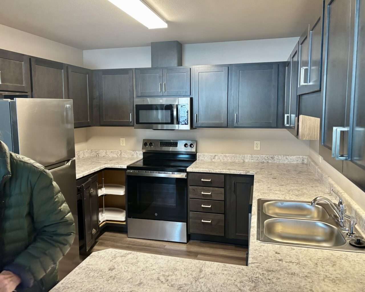 The kitchen space of a regular duplex unit at Flintwood Senior Housing in Russell. Photo by Tony Guerrero/Hays Post