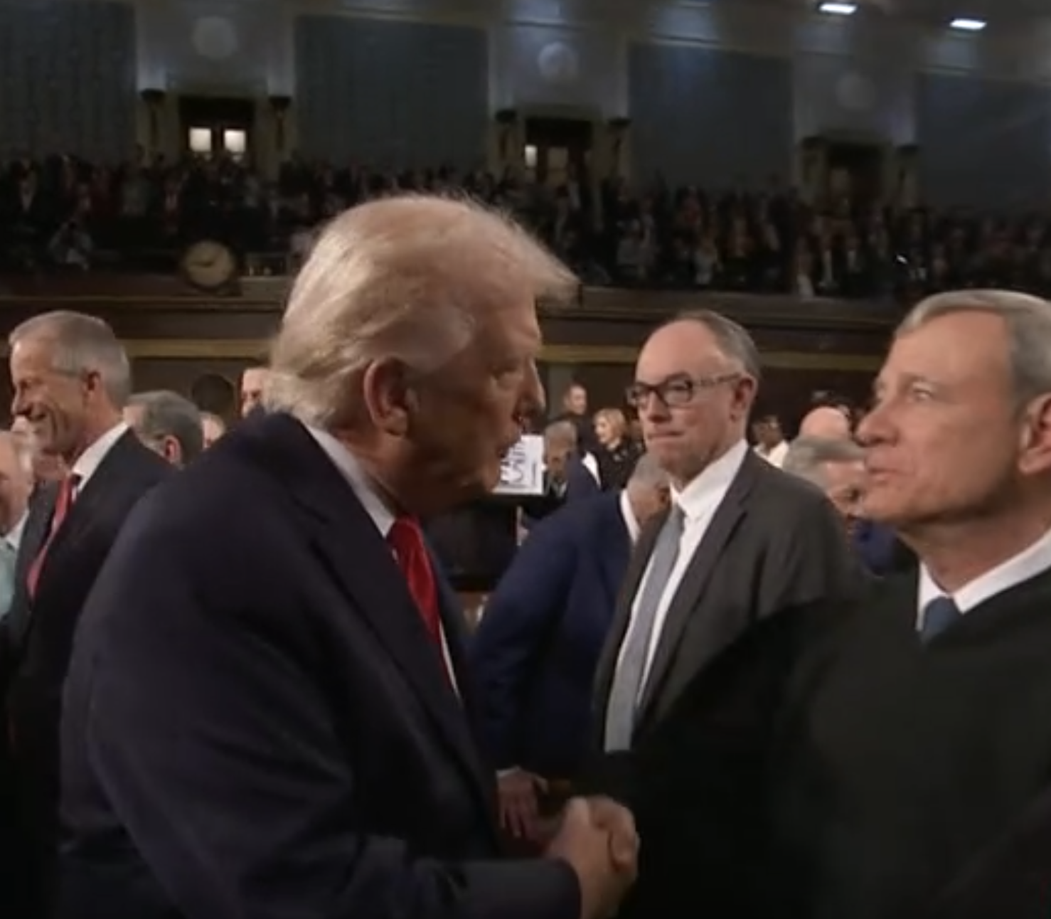 President Trump greets Chief Justice John Roberts-image from White House video