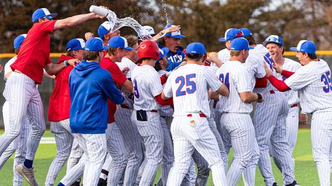 The Blue Dragon baseball team celebrates a walk-off win over the Northeast Community College Hawks Tuesday, Feb. 24, 2026 at Hobart-Detter Field. (Sydney Holzrichter/Blue Dragon Sports Information)