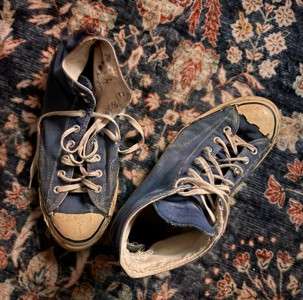 Meyer dug deep into the closet to bring a piece of memorabilia to Friday's anniversary ceremony with the blue Converse he wore during the 75-76 season.