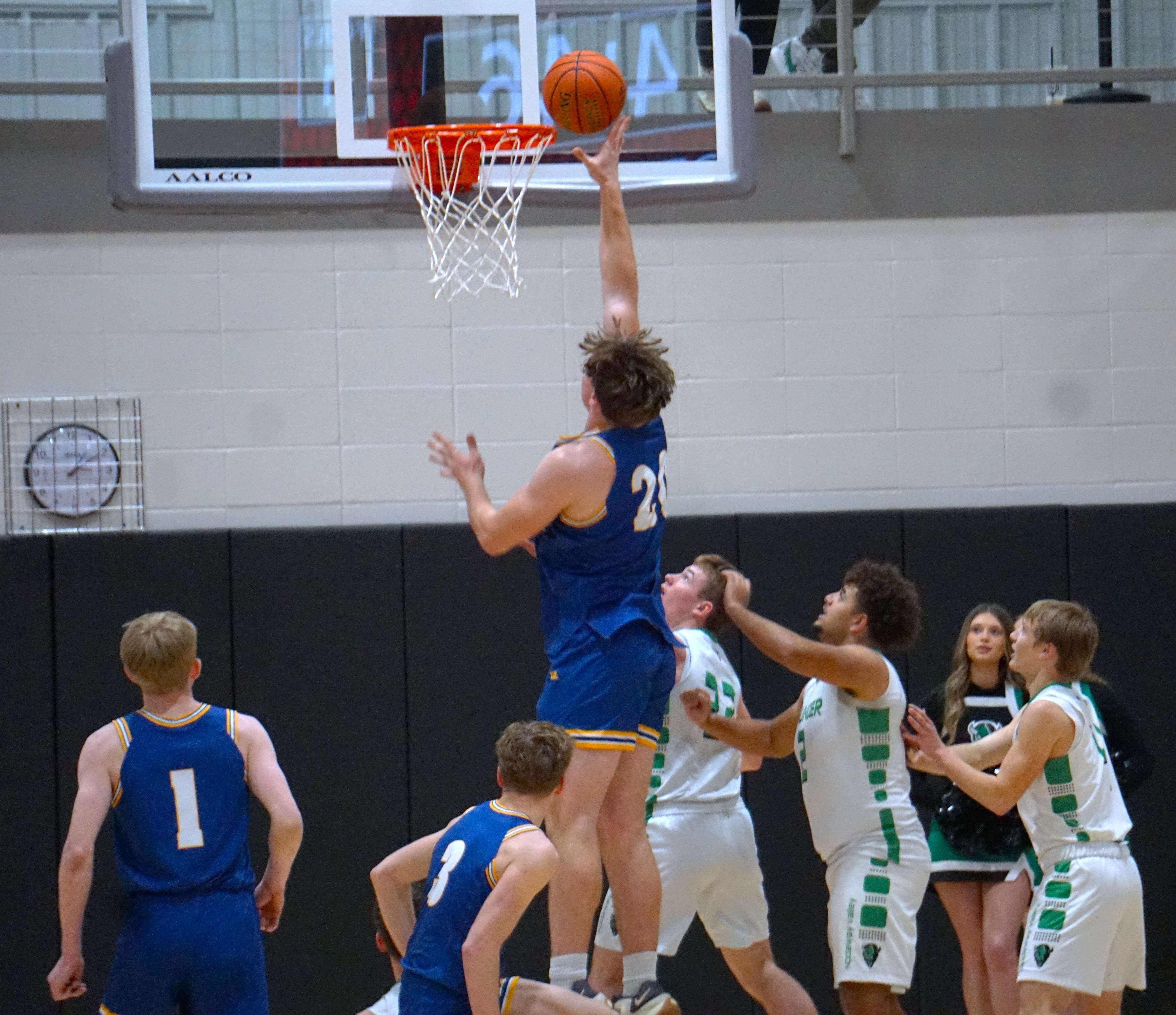 Jacob Miller (20) puts a ball up in the paint/ Photo by Matt PIke