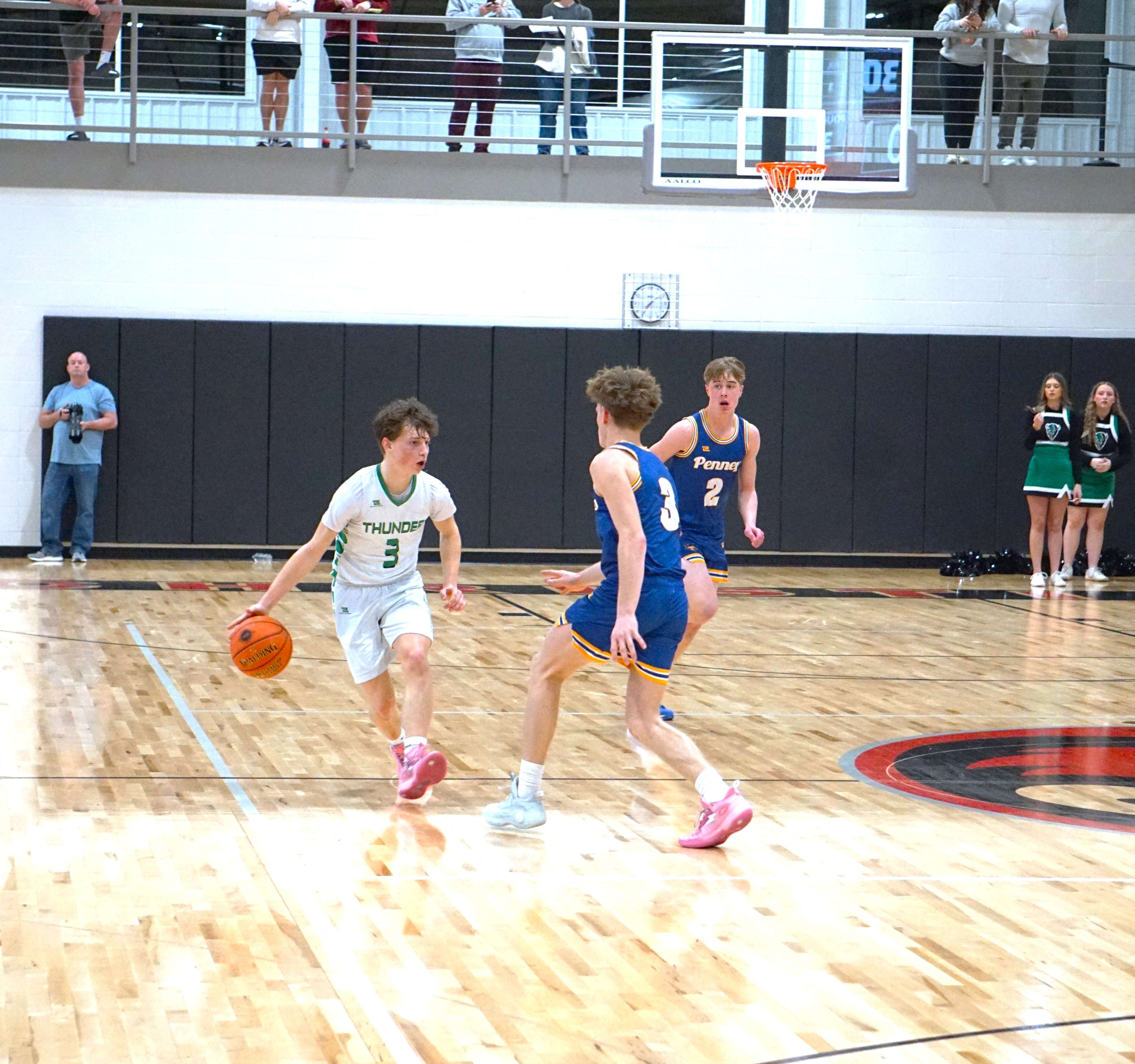 Braxton McGinness (3) brings the ball up against Jared Cooley (3)/ Photo by Matt Pike