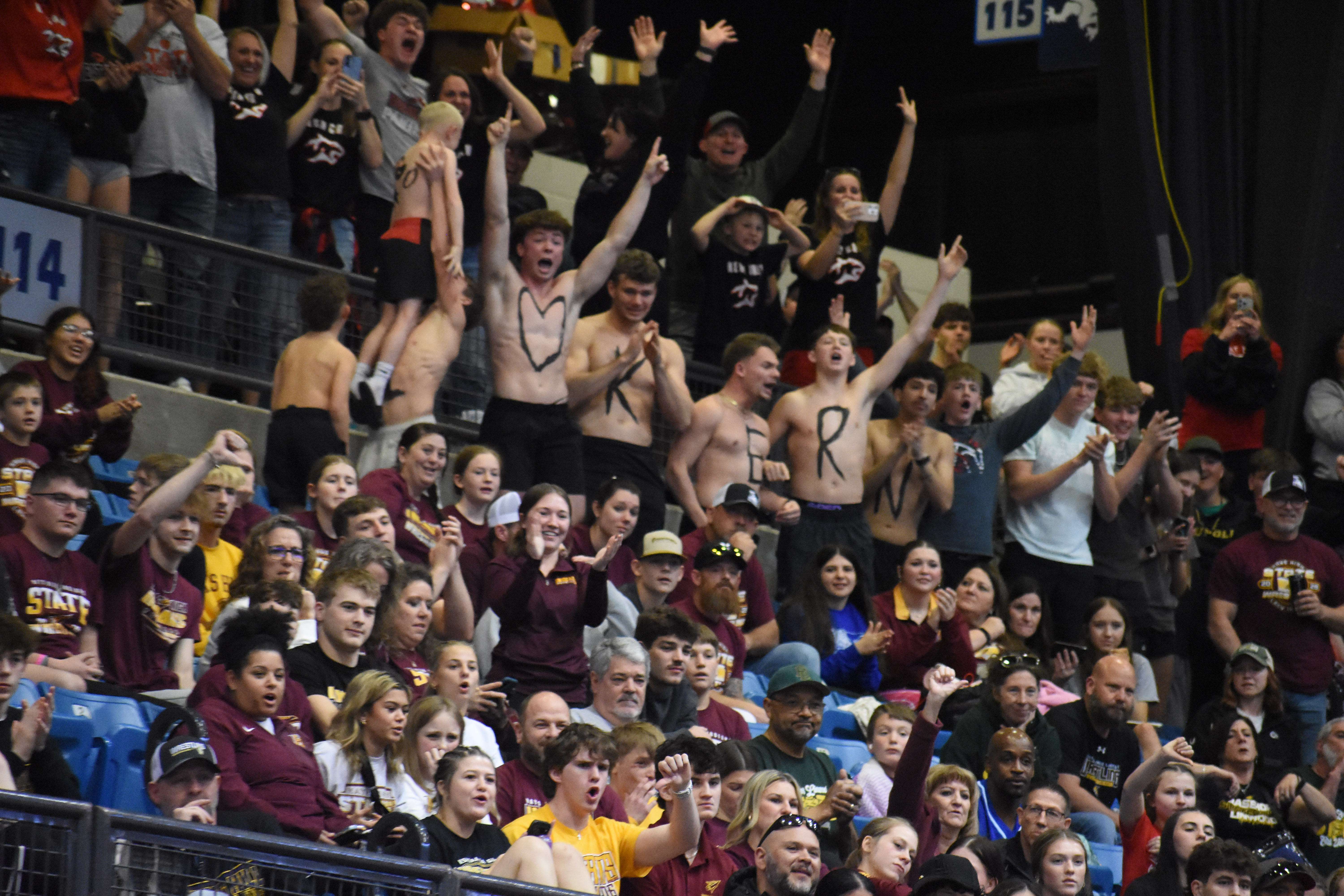 Kern's classmates and teammates respond after the final horn sounded.