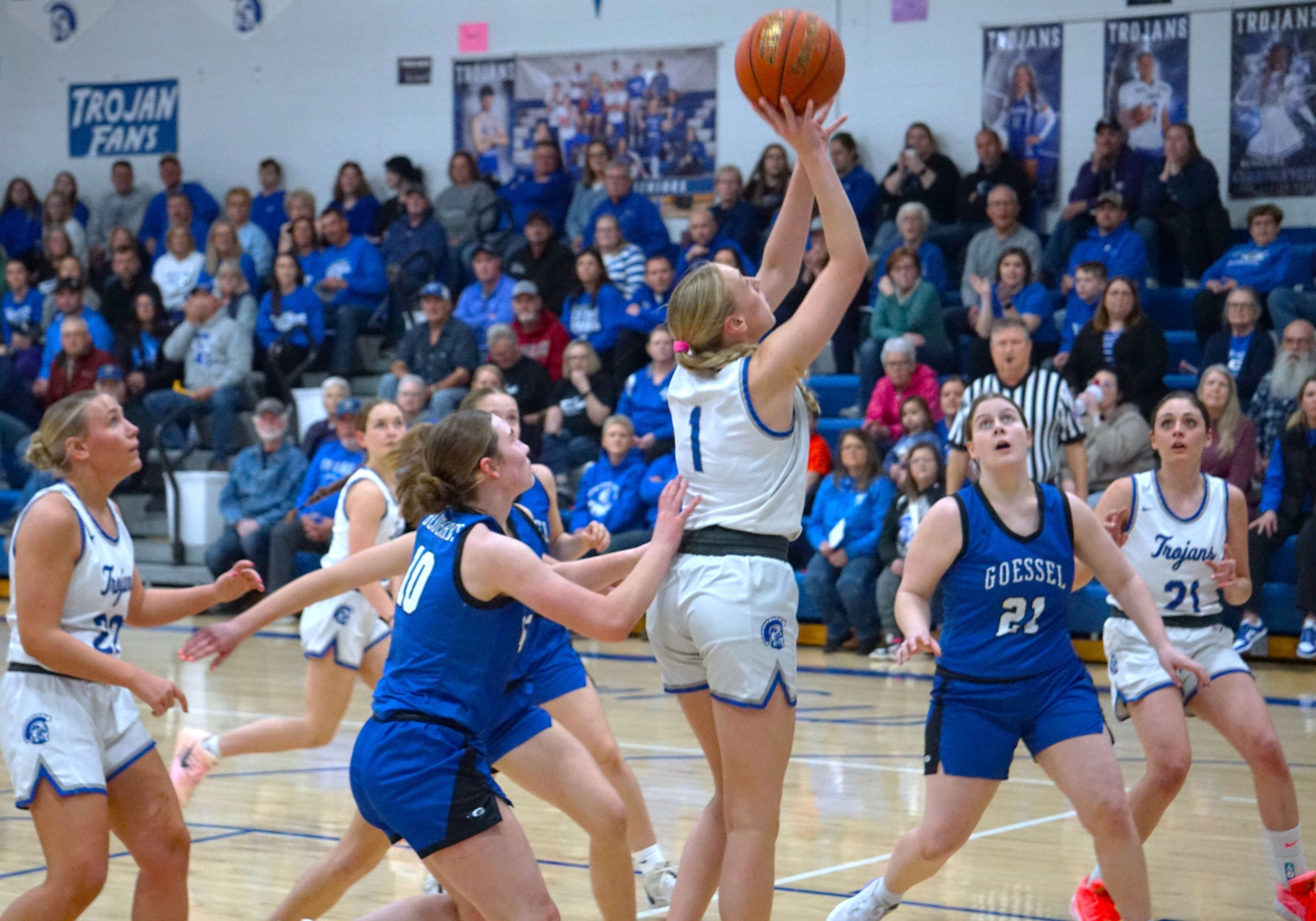 Harper Whetstine (1) goes for a layup in the paint/ Photo by Matt Pike